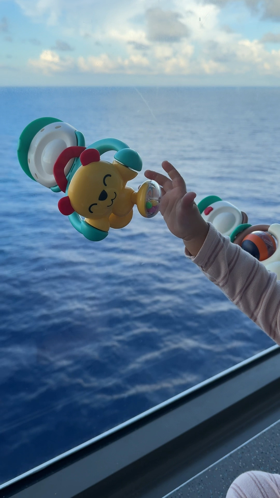 Great travel toys for baby we used them on the ship balcony but would be great for plane windows too! #travel #babytravel 