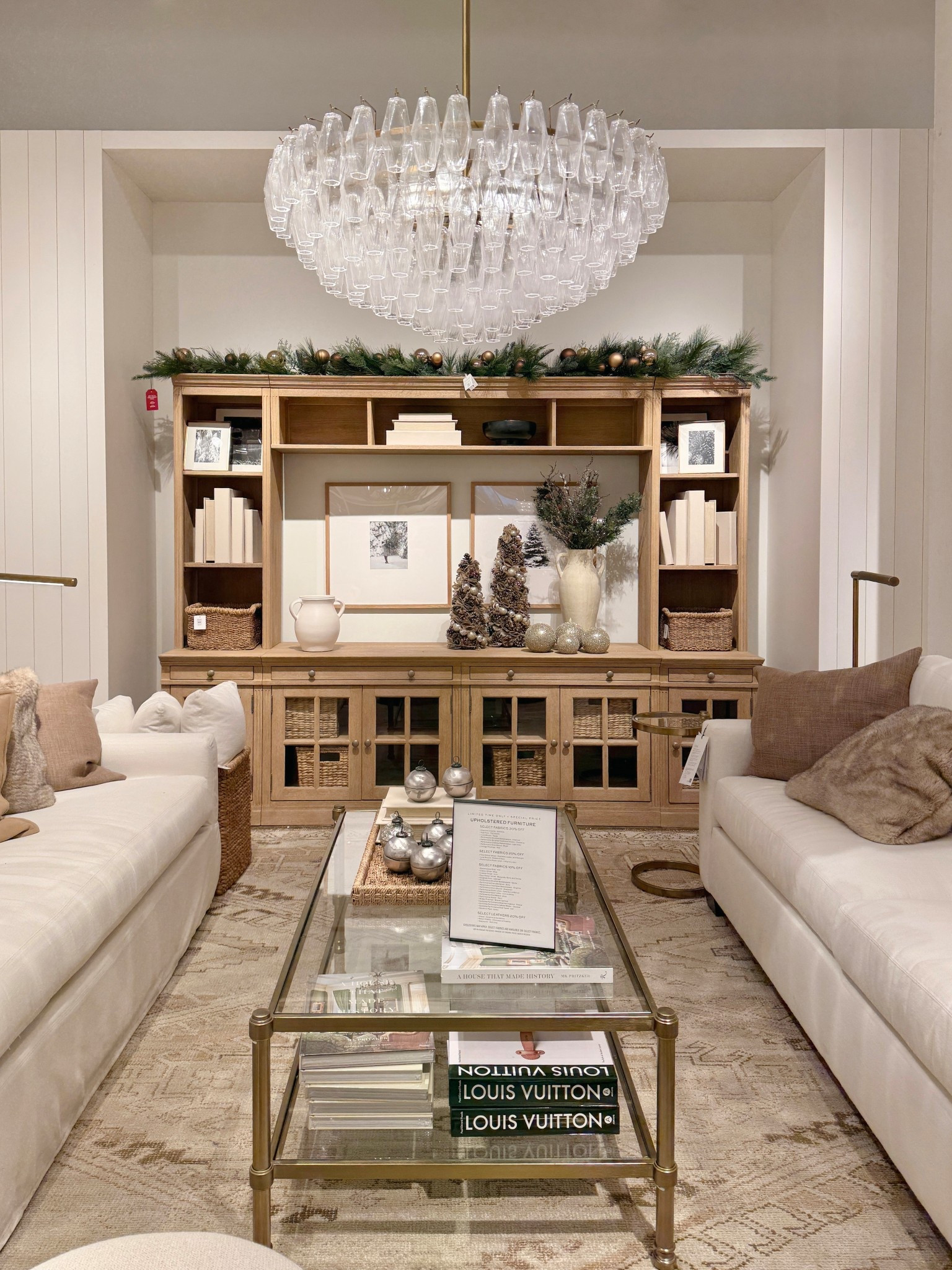 Gorgeous, cozy living room inspo! 😍 Featuring the Livingston 7-Piece Entertainment Center from Pottery Barn— such a beautiful statement for a family room. 🤎 Crafted from kiln-dried solid meranti wood with elegant veneers, it feels substantial and high quality while still looking warm and inviting. ✨ I love the mix of open shelving and closed storage, which makes it easy to style with books, art, and decor while keeping everyday clutter tucked away. 🤍 Finished in a range of timeless tones and detailed with glass doors and classic joinery, this setup offers endless ways to decorate and truly anchors the space. I’ve linked the entire setup for easy shopping! 💫 #LivingRoomInspo #EntertainmentCenter #PotteryBarn