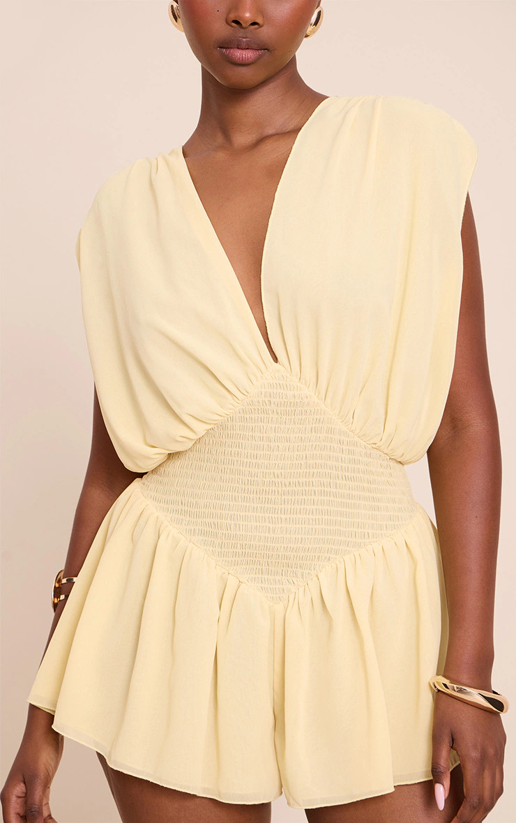 Lemon Chiffon V Neck Shirred Waist Frill Romper | PrettyLittleThing US