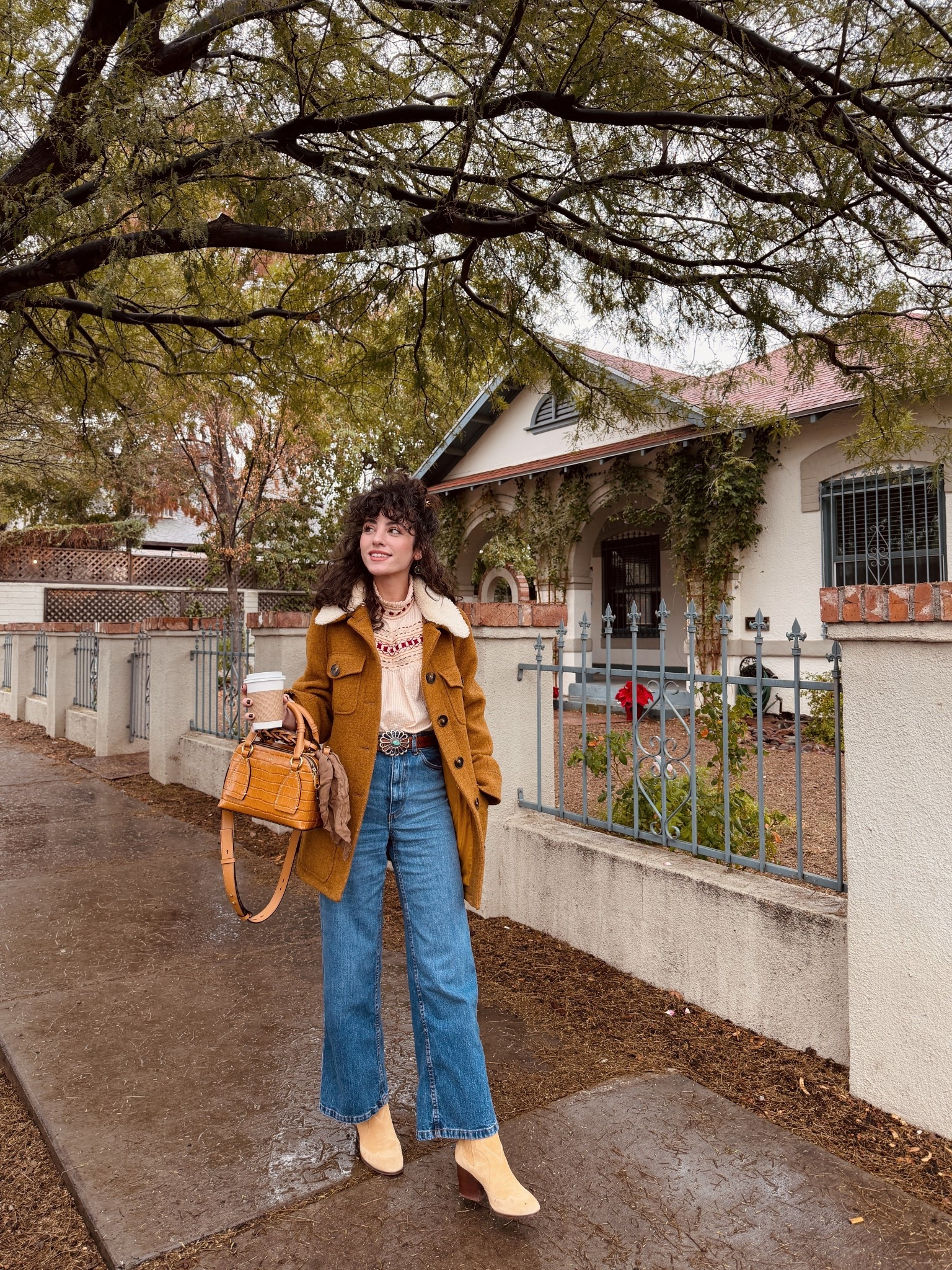 The embroidery on this blouse is one of my faves. Runs a little oversized. Perfect western boho look  

Statement belt, cozy coat, winter capsule wardrobe 

#LTKSeasonal