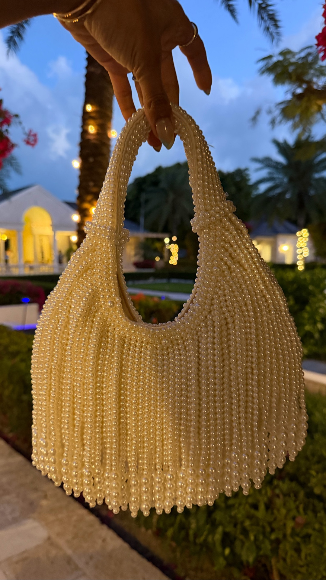 Guys: I brought several special bags on my trip including Hermes and Chanel, but this pearl bag was my fave and it’s less than $50! 

#LTKTravel #LTKootd