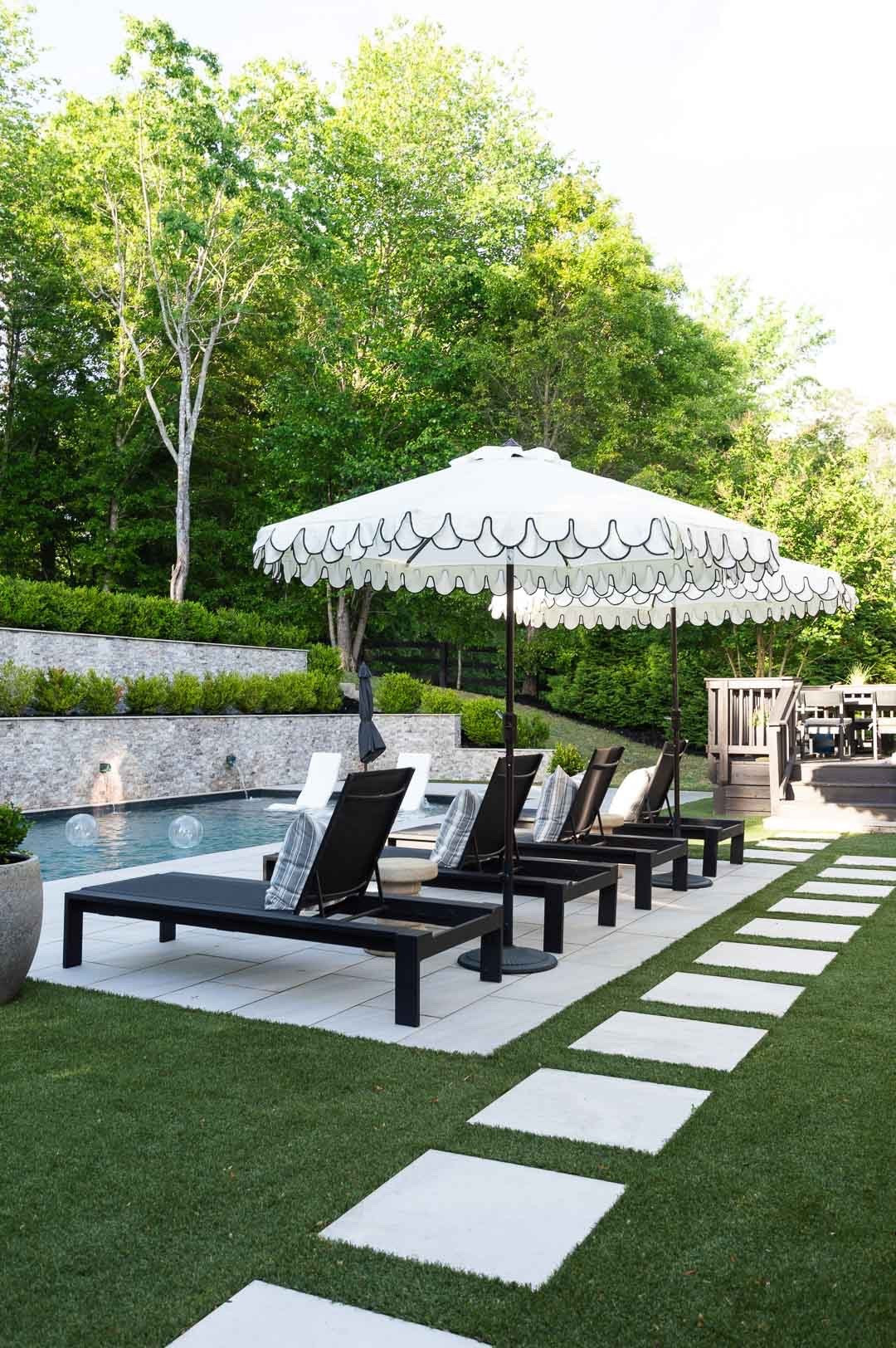 Spiffing up our patio and pool area! Obsessed with these on budget scalloped umbrellas and just grabbed a third! On sale and ship free 👏🏻 

#LTKSwim #LTKSaleAlert #LTKHome