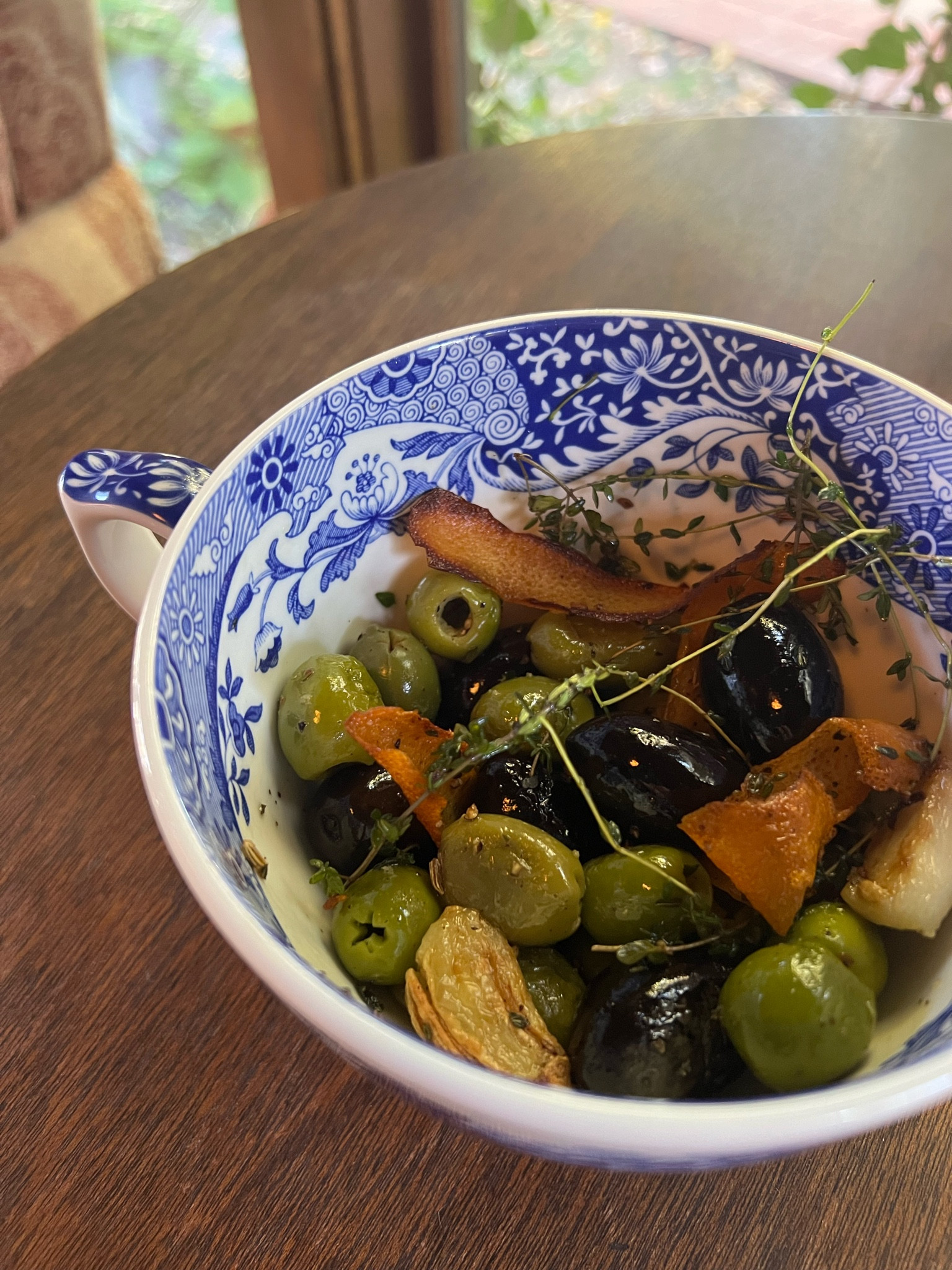Easy warm marinated olives in the cutest mug

#LTKHome