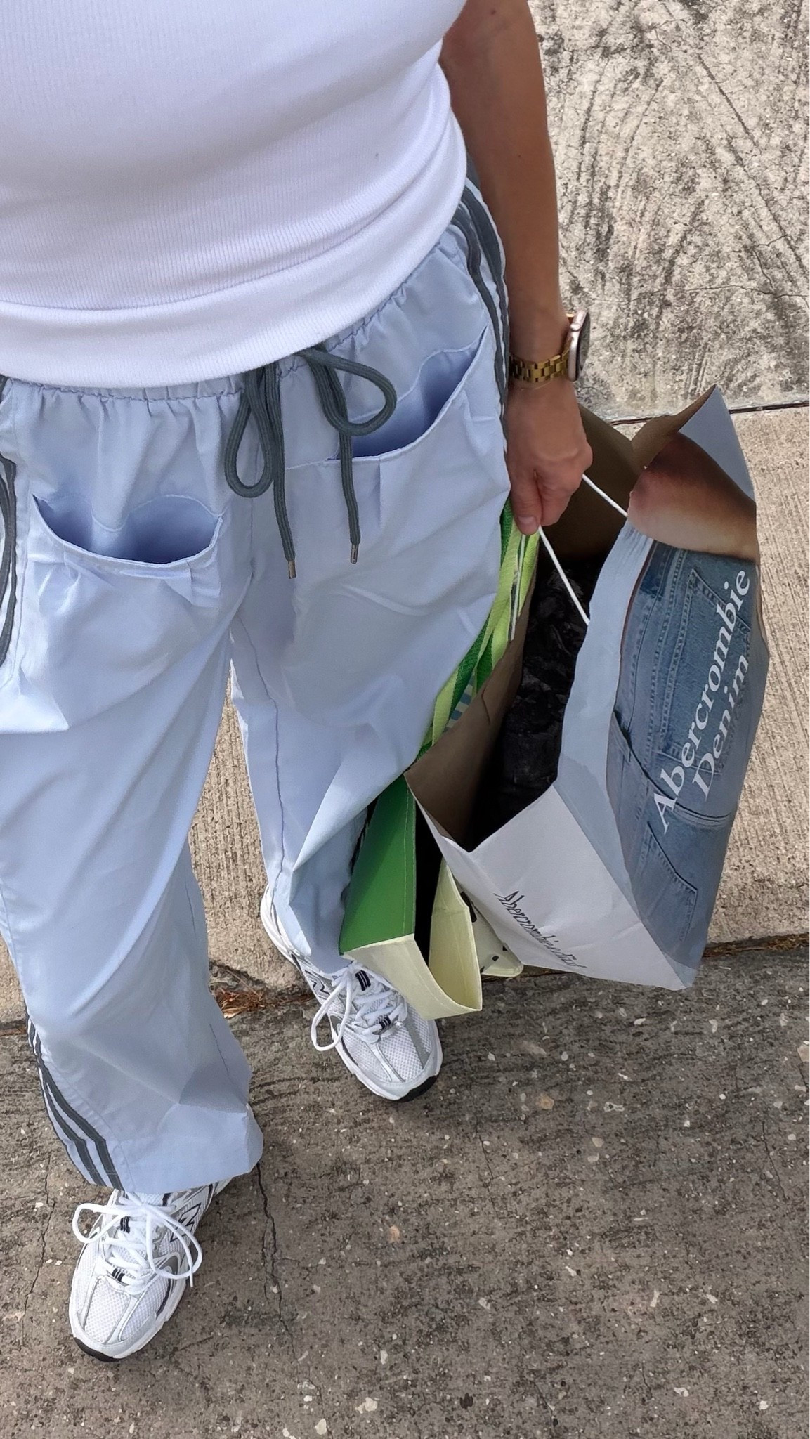 Shopping OOTD & what I grabbed! S in bra tank and S in track pants! Sneaks tts.

#LTKootd #LTKmomlife #LTKdayinmylife