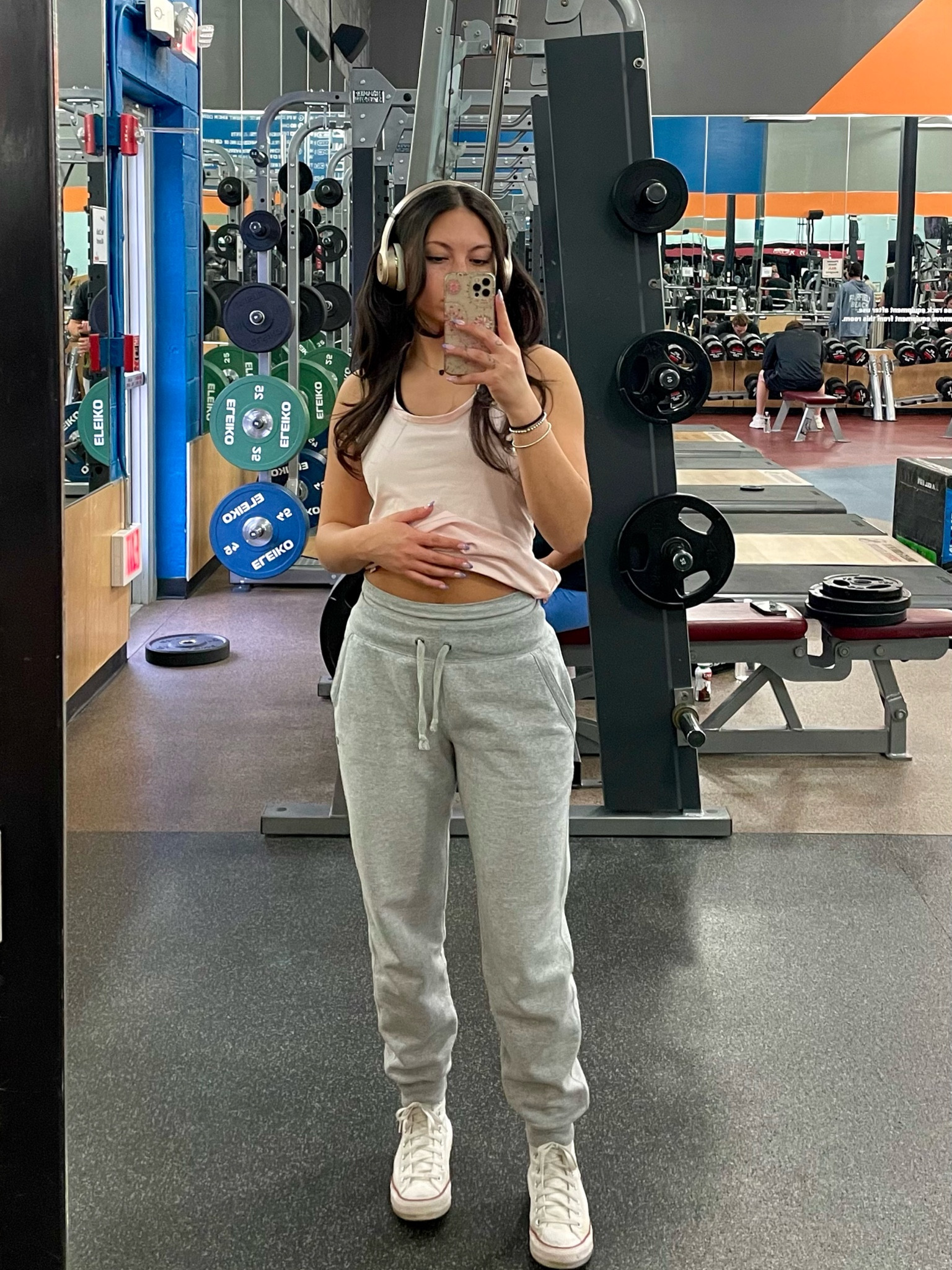 One of my favorite gym outfits 💕 
~ Beats headphones. Always love these they’re very comfortable and block out all noise. 
~ Light pink tank top from RBX which is super comfortable. They’re clothes keep they’re soft texture even after many washes. 
~ Light grey shorts under sweatpants. (I attached similar ones)
~ Grey Champion sweatpants. Always a go to. 
~ My white high top Converse as always! 

#LTKfindsunder50 #LTKMostLoved #LTKfitness