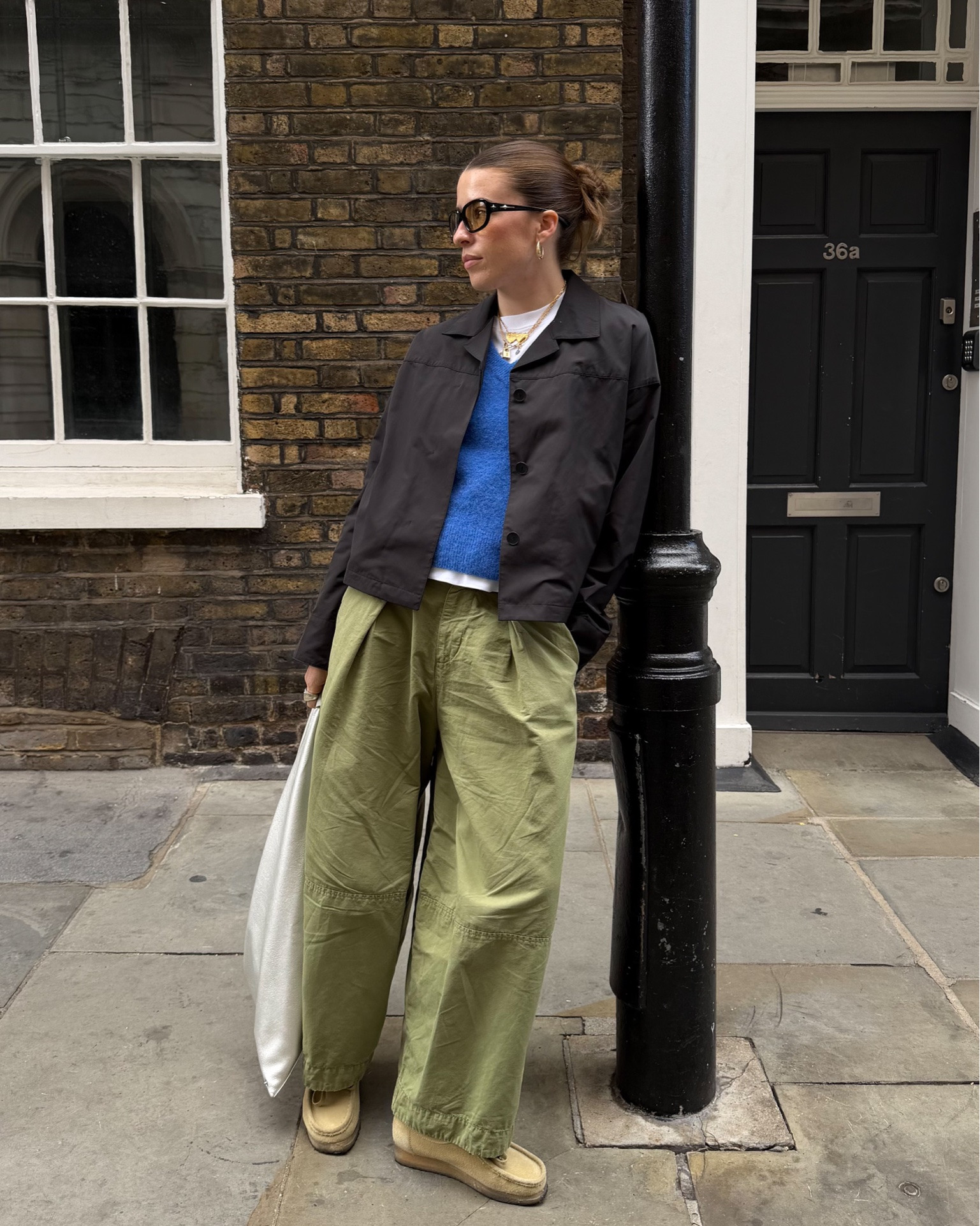 Green trousers, blue sweater vest, cobalt blue, Clark’s wallabees, autumn outfit, autumn style

#LTKautumn #LTKeurope #LTKuk