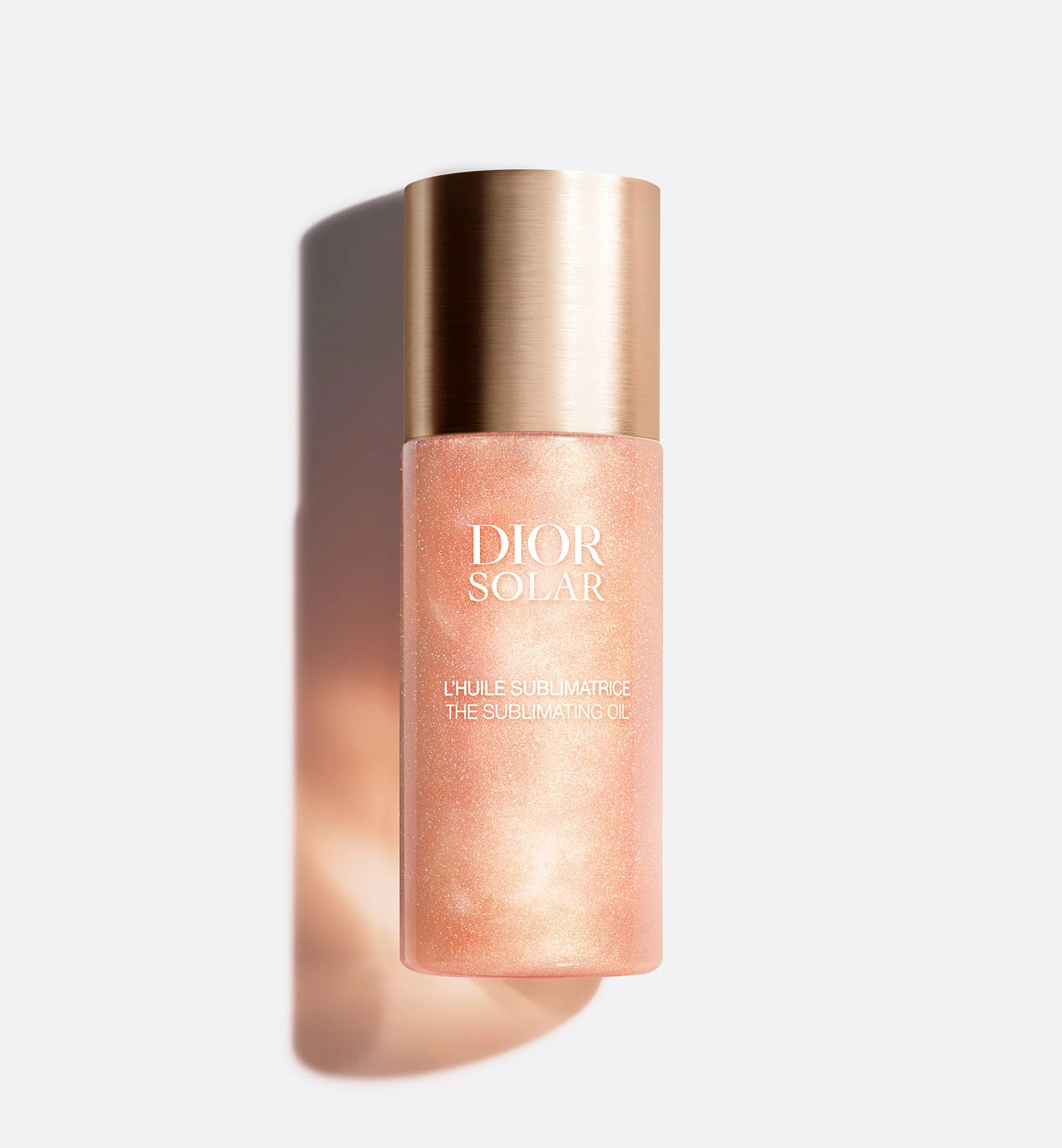 Dior Solar The Sublimating Oil is a sparkling dry oil for face, body and hair that enhances them ... | Dior Beauty (US)
