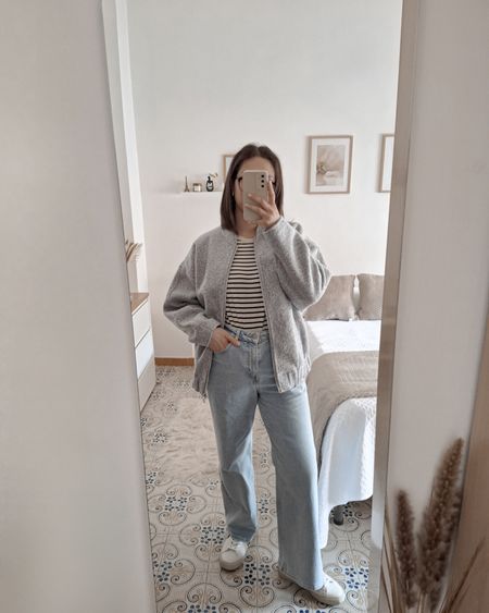Love this ootd 🩶

- Bomber is from zara I've linked similar options
- Striped long sleeved top: wearing a medium 
- Wide leg jeans: wearing a size 10
- Veja campo runs TTS

fashion inspo, spring outfit, spring ootd, casual outfit, casual ootd, casual chic, casual chic ootd, teddy bomber, bomber boucle, gray bomber, striped top, long sleeved top, wide leg jeans, high waist jeans, white sneakers, veja campo, style inspo, women fashion

#LTKSeasonal #LTKstyletip #LTKshoecrush