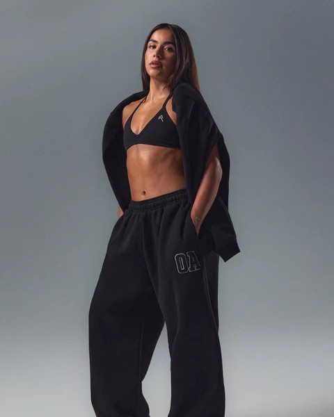 EnhanceLift™ Seamless Minimal Halter Neck Bralette with White Logo 
 Black | Oner Active (UK / US)