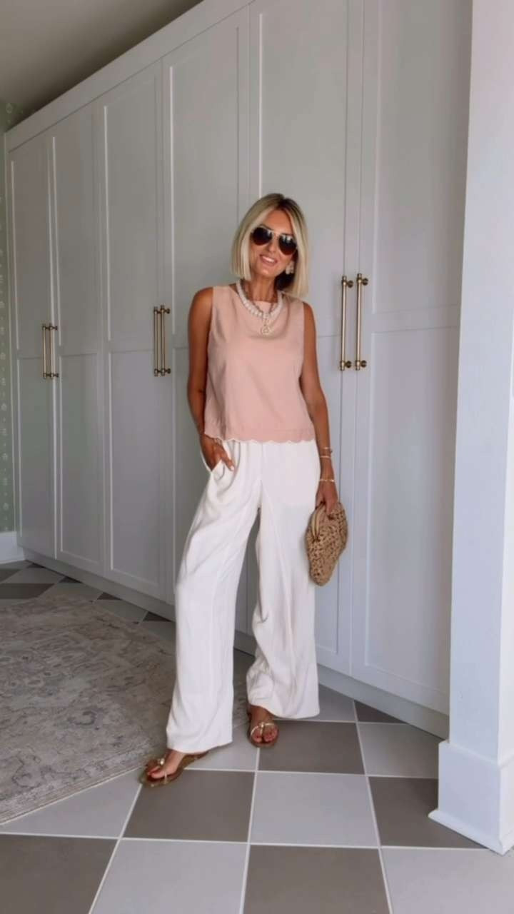 This pink top is so cute! I love the scalloped edge on the bottom! I just paired it with some linen pants. Such a cute look for summer! Wearing S!

Loverly Grey, Amazon, summer outfit, vacation looks 

 #LTKSeasonal