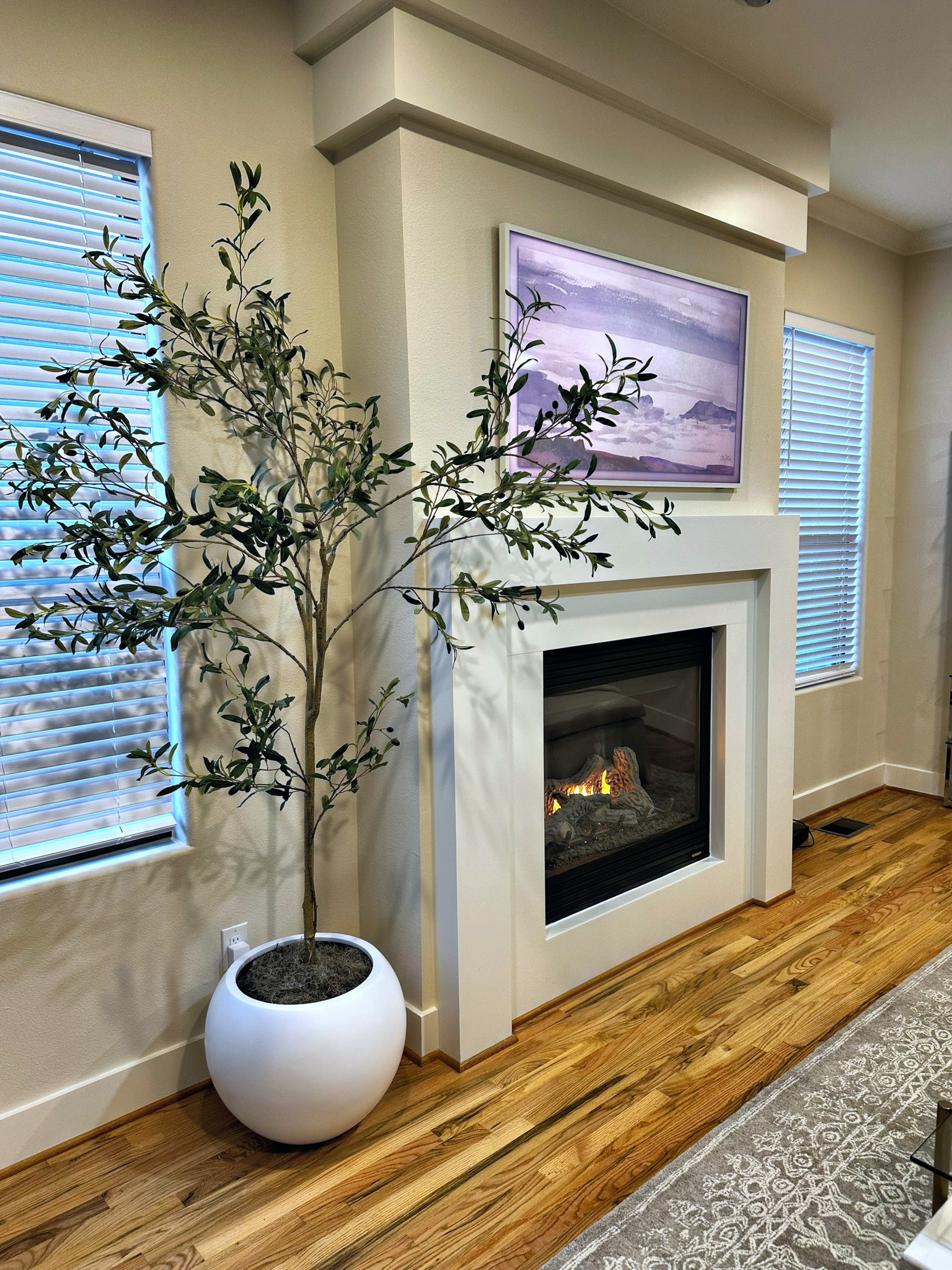 Faux olive tree and planter. Bought two packs of the moss

#LTKHome