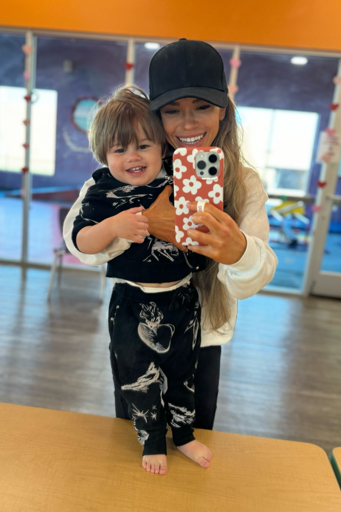 Mommy and me outfit 🖤 Im wearing a white crewneck sweatshirt, black leggings, and black hat. P is wearing the cutest tattoo print set from nununu, a brand I absolutely adore for edgy kids clothing!

#LTKstyletip #LTKkids #LTKfamily