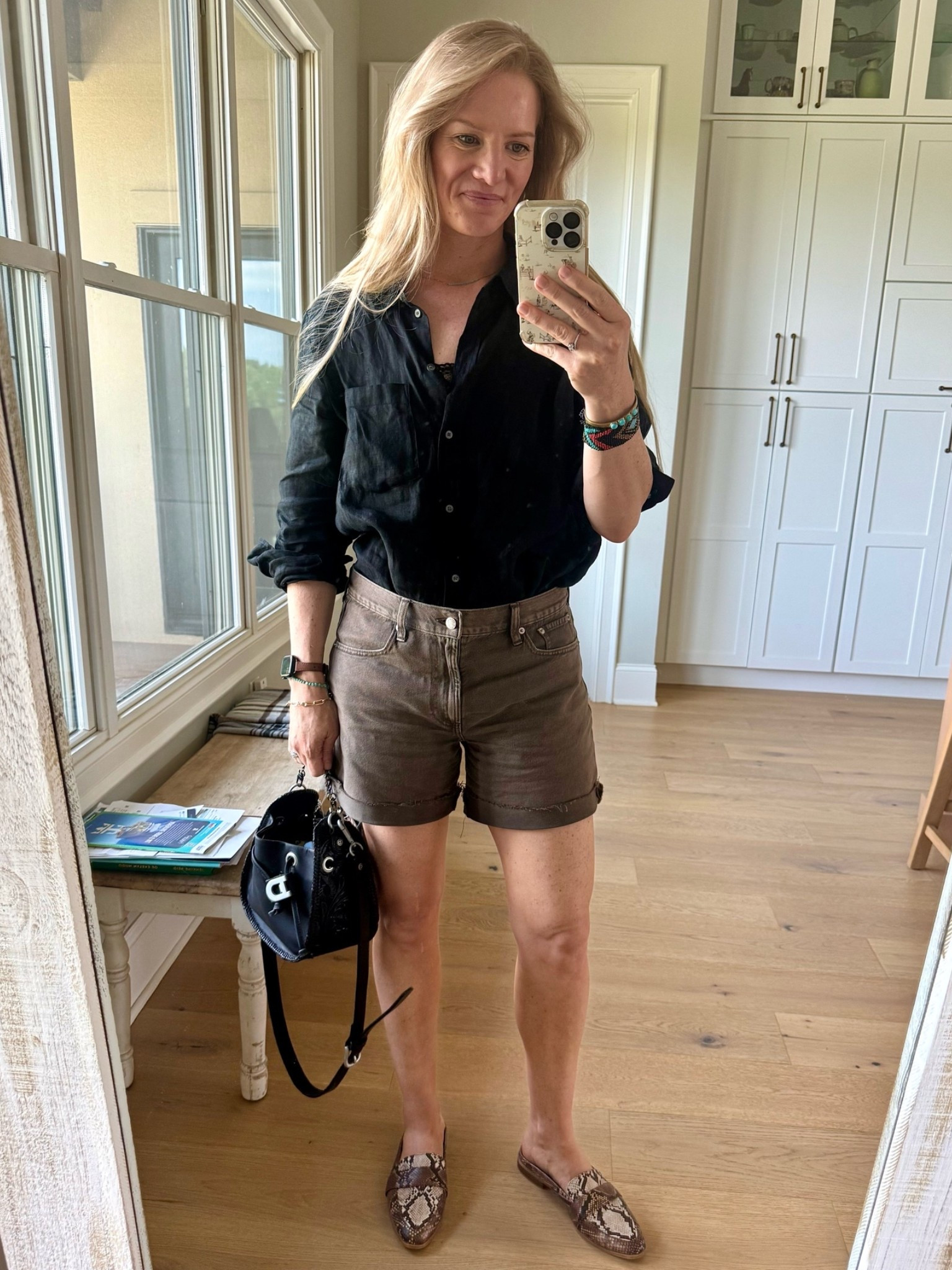 OOTD 
Happy Saturday!!

Size reference 5’ 9” 140 lbs

Black linen shirt - medium tall
(Gap boyfriend style)

Brown denim shorts - 29 for a little looser fit. Normally a 27/28.

Slides - old target

Bag - Double D Ranch



Outfit of the day. Shorts outfits. Weekend style. Classic style. Gap denim.

#LTKootd #LTKTall #LTKOver40