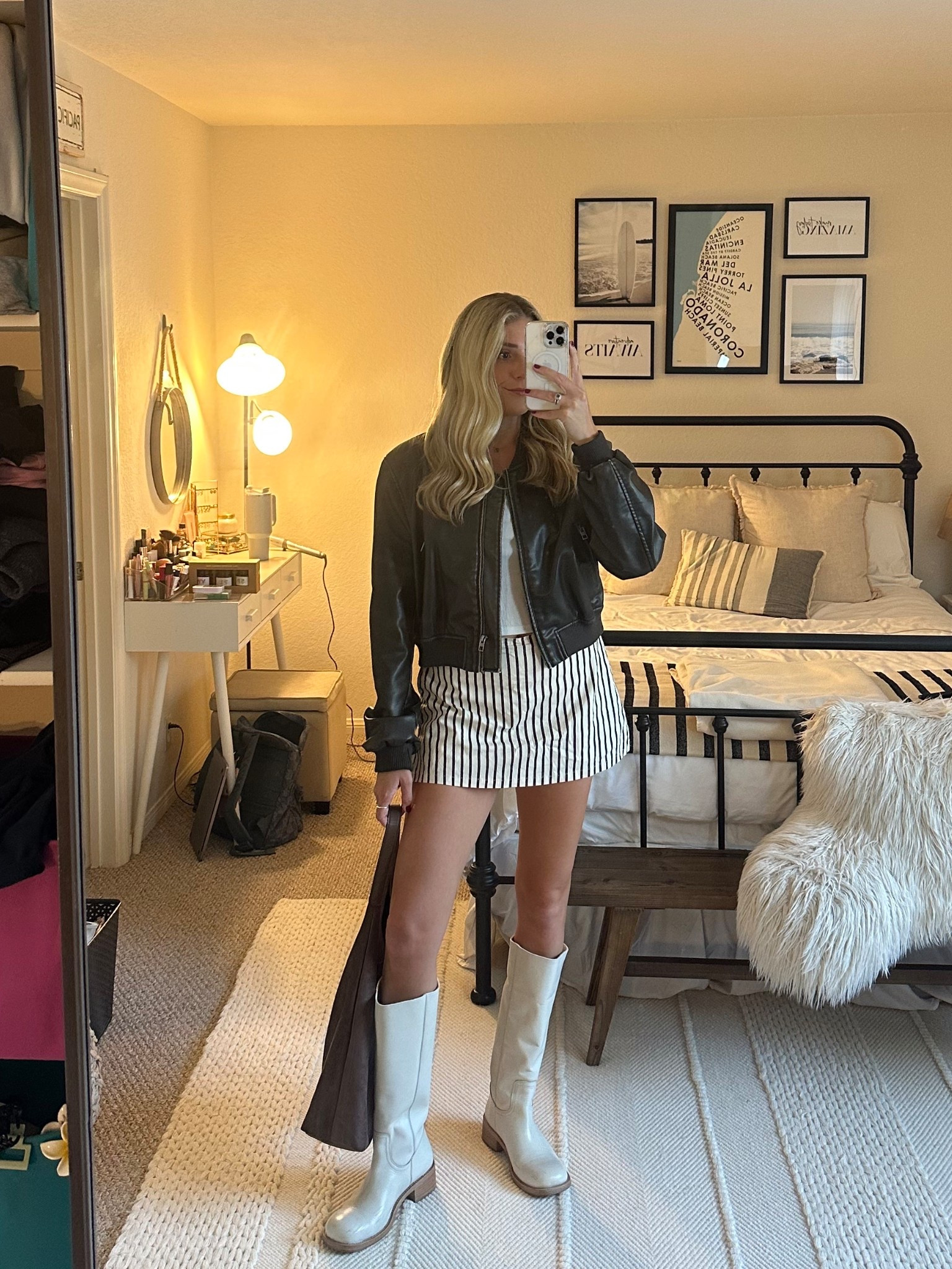 fall transition outfit / brown striped skirt, leather jacket and white bone tall boots