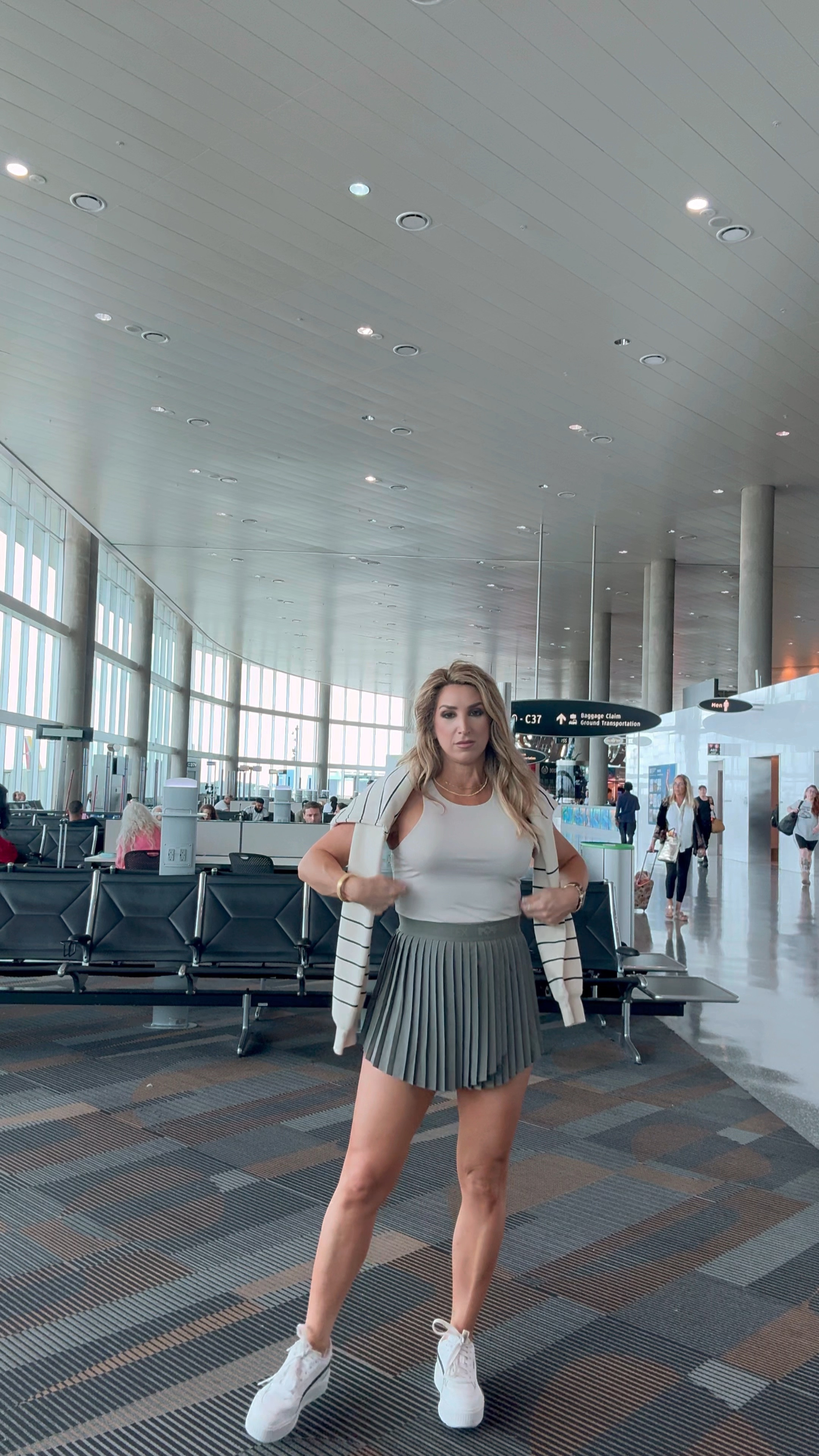 Me playing it cool and “low key” at the airport this week. 😅✈️

Travel outfit, pleated tennis skirt, sleeveless bodysuit, skims, puma sneakers, stripe sweatshirt

#LTKFindsUnder100 #LTKStyleTip #LTKTravel
