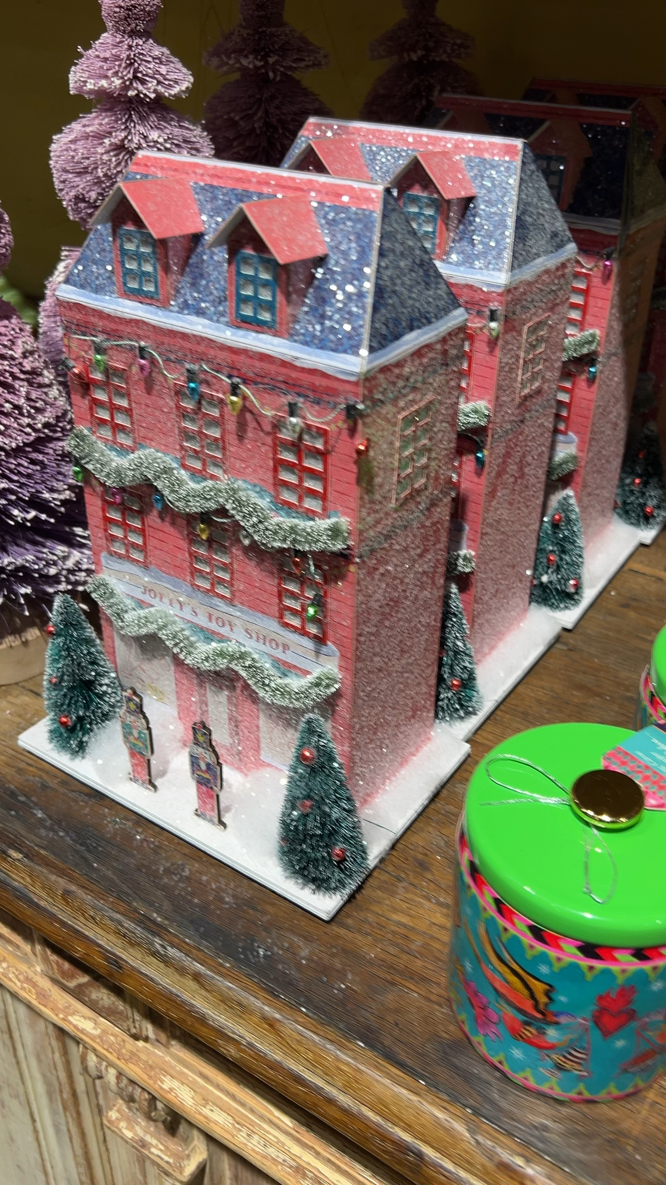 These illuminated shops create a charming holiday village display that's perfect for decking out your entryway table.

Inspired by Après ski and alpine culture, this whimsical collection showcases festive prints and jewel-toned hues, designed exclusively for Anthropologie by George & Viv with oh-so-charming art by Emily Taylor.

#LTKSeasonal #LTKhome #LTKHoliday