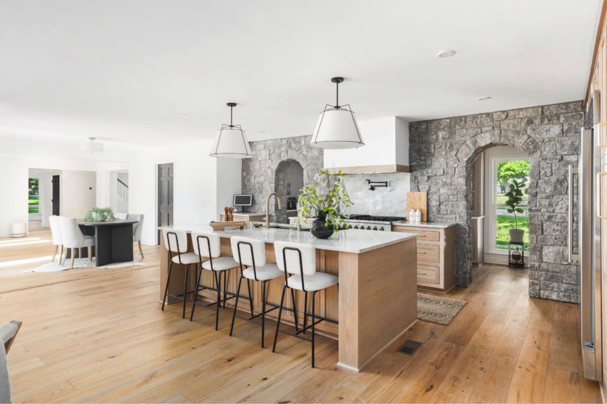 Shop our kitchen! These are custom white oak kitchen cabinets with Taj Mahal quartzite countertops. The wall color is Sherwin Williams pure white. The backsplash stone is gray Tennessee limestone. I absolutely love these island lights, for an 8’ island these are perfect sizing! 
The 4 bar stools are a set and are a STEAL! 
For professional grade appliances this 48” fridge and 48” gas range are very budget friendly! 
I love the large sink with double faucets! We also have double 18” dishwashers that are panel ready Zline! I would recommend doing 2 24” however, the 18” are just to small. I love the pot filler and all the things about our kitchen! 

#LTKU #LTKHome #LTKStyleTip

#LTKU #LTKHome #LTKStyleTip