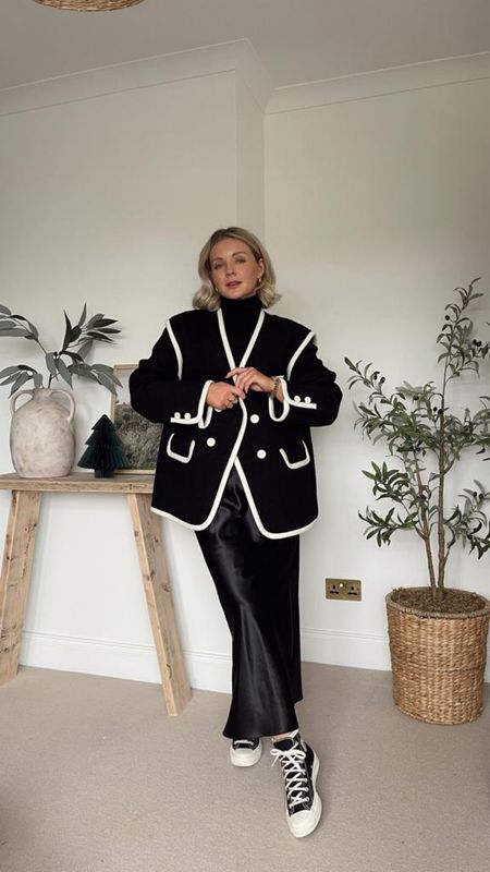 Ways to wear a black satin skirt - black and white smart casual look. Black phase eight roll neck jumper, Mo&Co black and white piped edge blazer jacket, platform converse  

#LTKSeasonal #LTKeurope #LTKstyletip