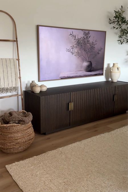 Living room views 😍

Tv stand | organic modern living room | neutral rug | neutral decor

#LTKHome