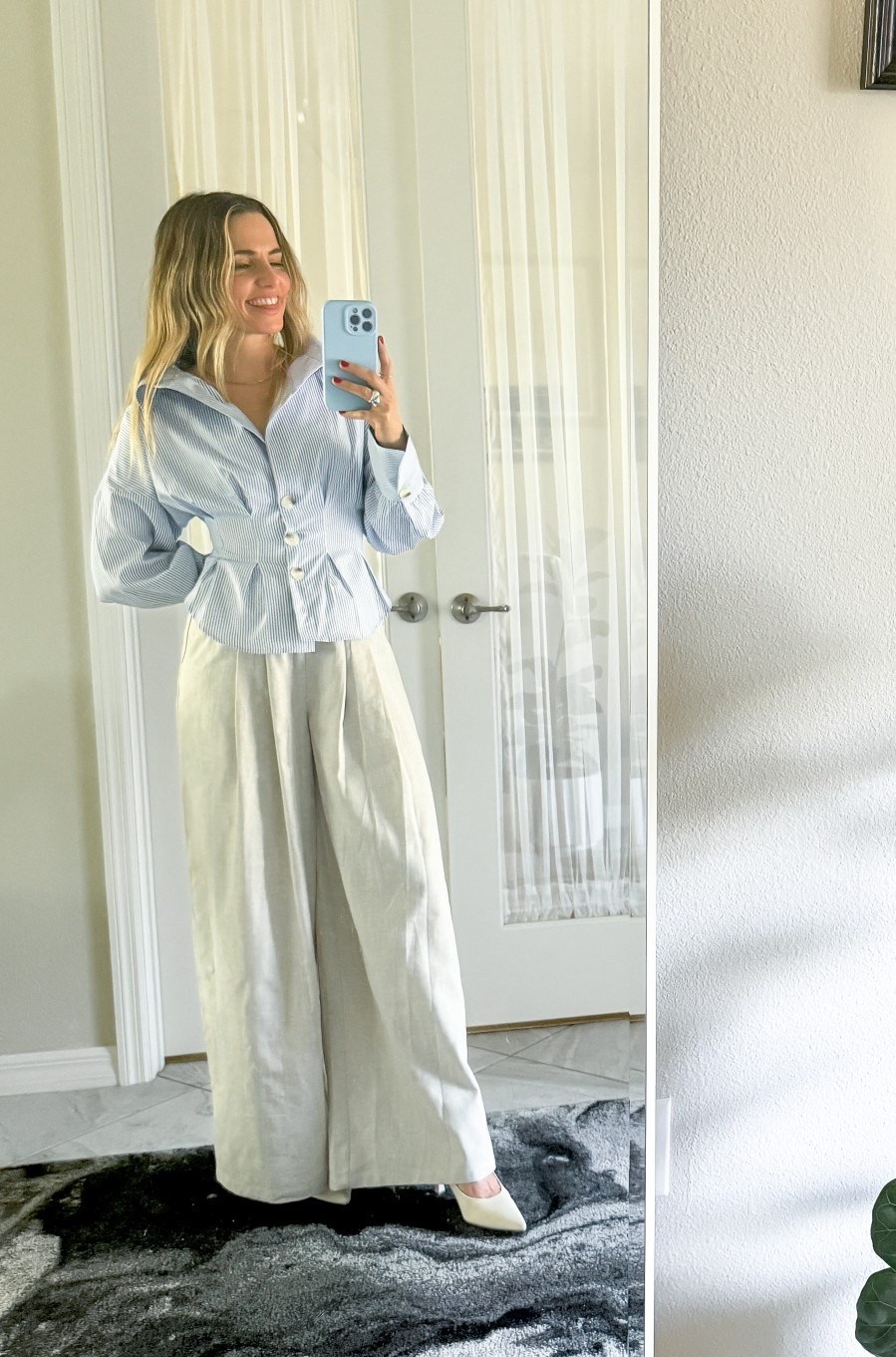 because corporate style can still feel feminine and modern 🤍 i’m loving this structured striped button-down with the softest linen trousers - it’s very quiet luxury meets corporate girlie. this combo is polished enough for meetings but comfy enough for a full workday or travel day.

wearing a size small in both pieces. the shirt has an exaggerated collar + tailored waist that elevates any outfit, and the linen trousers have that relaxed, effortless drape that is so comfy.

#corporateoutfits #officeoutfits #corporatestyle #officeoutfitideas #quietluxury 

#LTKSeasonal #LTKStyleTip #LTKWorkwear