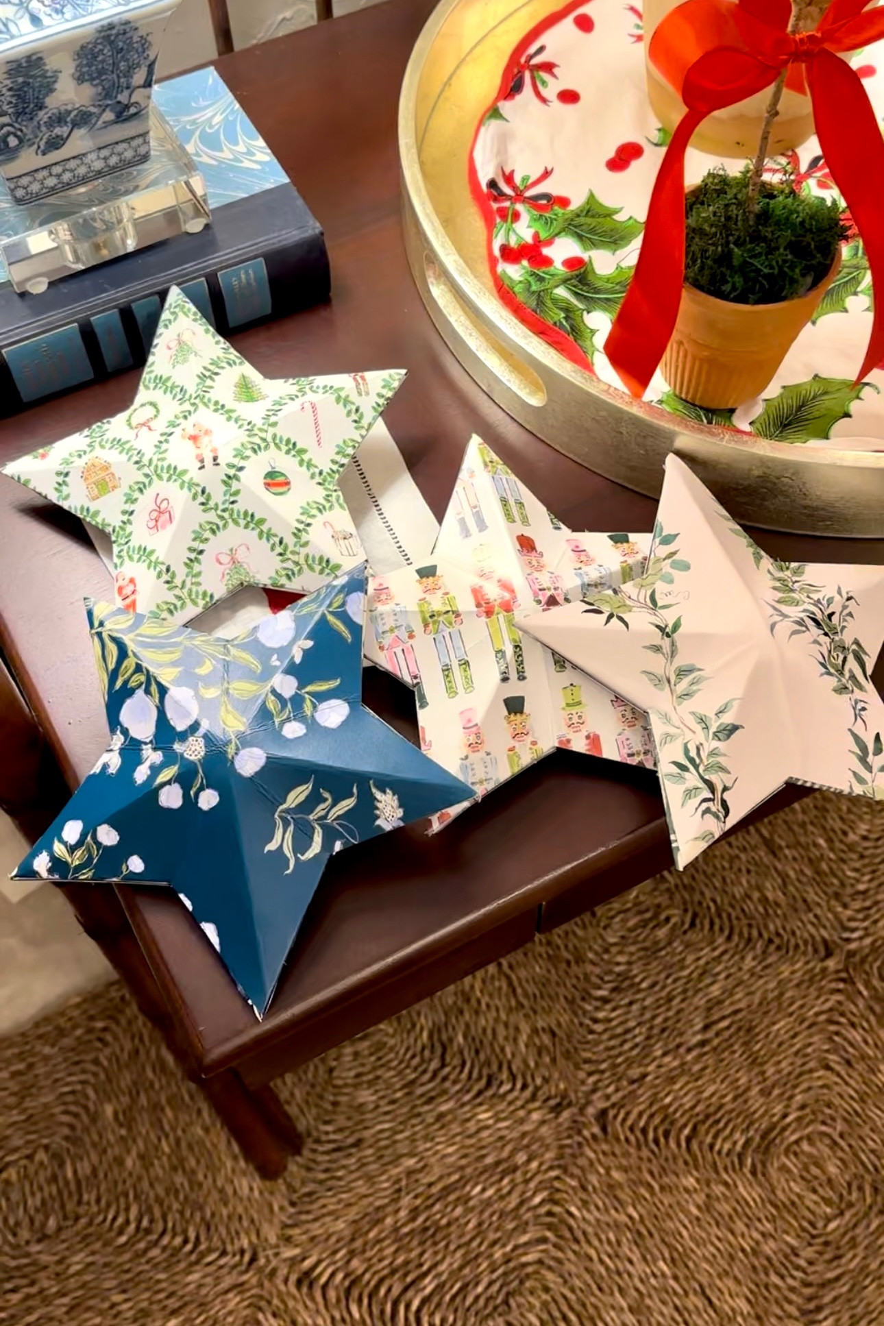 If you’re like me then you probably have some wrapping paper that feels too cute to just use for present wrapping! That’s how I felt about some of the prints I have from @evelynhenson’s collection and after seeing some creative 3D paper stars I decided to try to make my own. If you can cut and fold and pick out wrapping paper you love then you can make these!

I’ve shared everything I used to make them including the star template in case you want to decorate with them too. I have plans to make more to match our decor and even want to figure out a way to make a larger version to use as a tree topper! 

#LTKHoliday #LTKFindsUnder50 #LTKHome