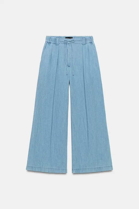 Flowing trousers made from a cotton and linen blend. Elasticated waistband at the back with a fro... | Zara UK