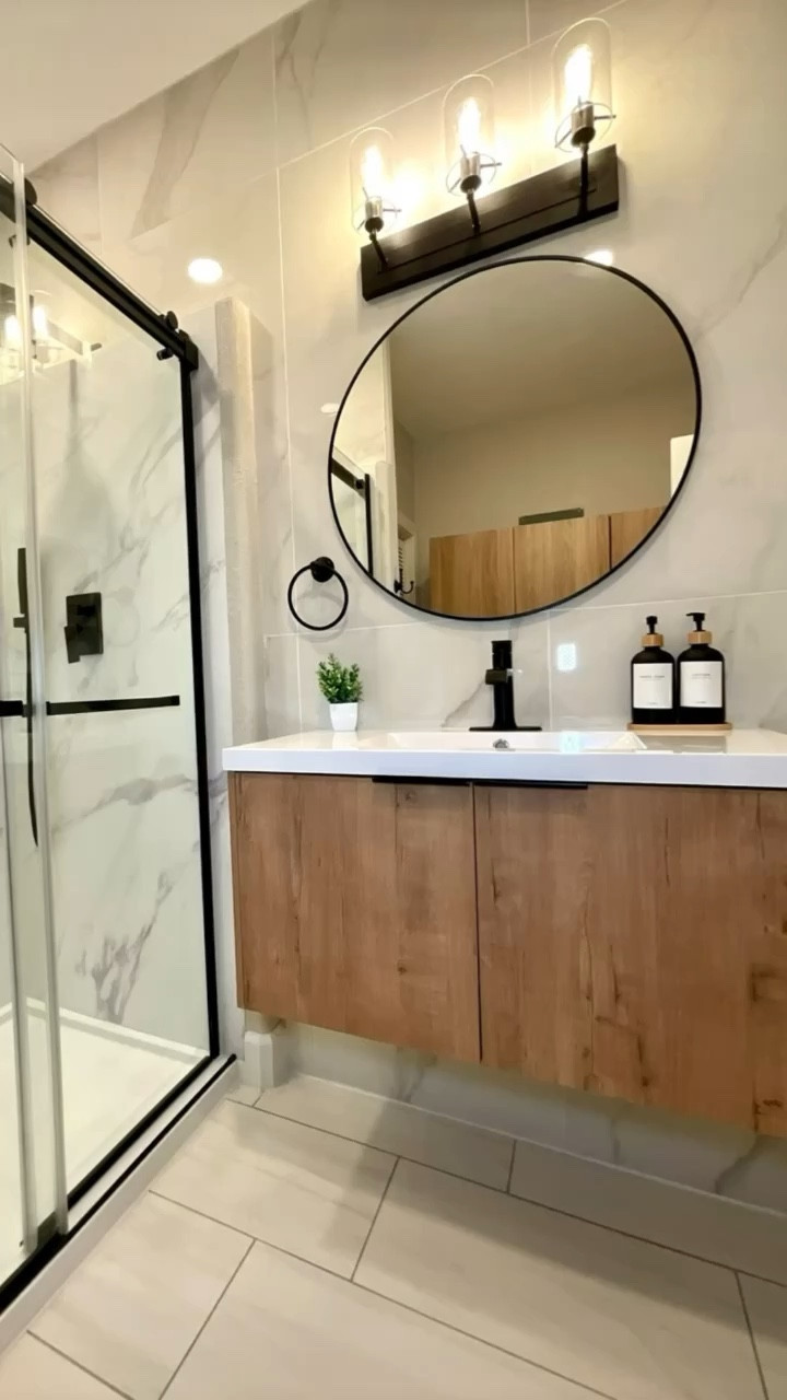 Black and wood modern bathroom design

#LTKhome #LTKstyletip