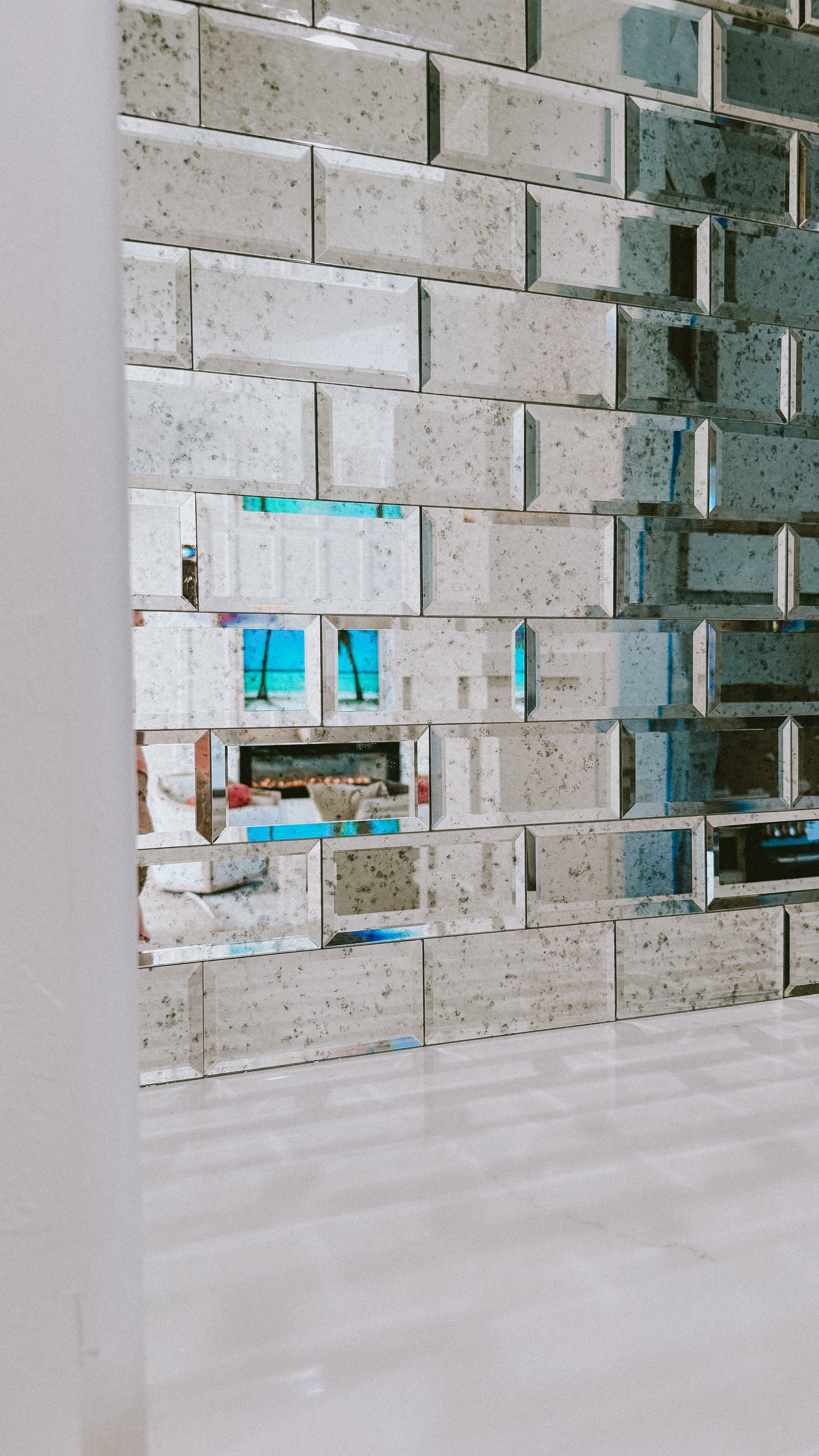 Loving the texture the beveled mirror tiles give the bar area!  Just gorgeous!  

#LTKHome #LTKStyleTip #LTKMostLoved