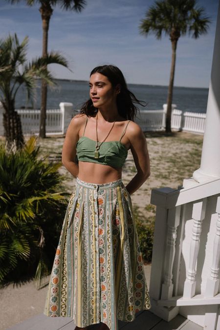 Adorned with pleats that move gracefully with every step, the Briony Skirt balances tailoring and ease. Its tortoise buttons add a touch of classic refinement, while the vibrant print, reminiscent of mosaic tiles, infuses your ensemble with a burst of color and joy. The perfect skirt for vacation, summer, spring 

#LTKswim #LTKstyletip #LTKtravel