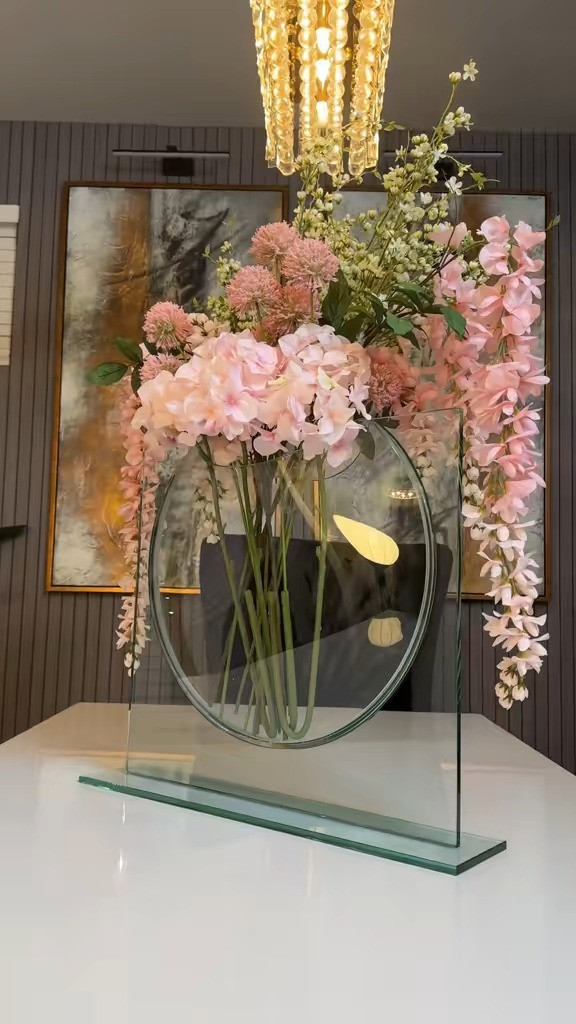 The easiest way to make your space feel luxe without redecorating everything.
This sculptural glass vase instantly elevates any table, console, or kitchen island. The modern design makes it a true statement piece, and when you add florals it becomes the perfect focal point for your space.
If you’ve been wanting your home to feel more elevated and designer-inspired, this piece does exactly that without requiring a full room makeover.
I linked the vase so you can shop the look.
Trust me… it’s one of those pieces that instantly transforms a space.
Shop it below. 

 #LTKSeasonal #LTKHome #LTKSaleAlert