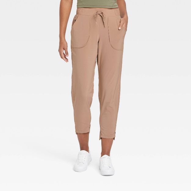 Women&#39;s Tapered Stretch Woven Pants - All in Motion&#8482; Taupe XS | Target