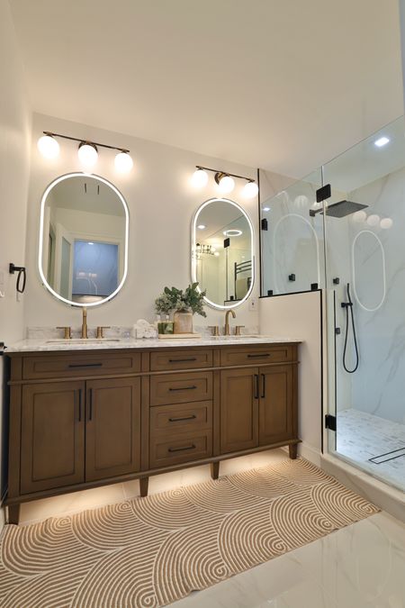 Loving the warmth that this bathroom vanity gives 😍👌🏾 I added this to a recent bathroom project and the space turned out so beautiful! #bathroomdecor 

#LTKsalealert #LTKSeasonal #LTKhome