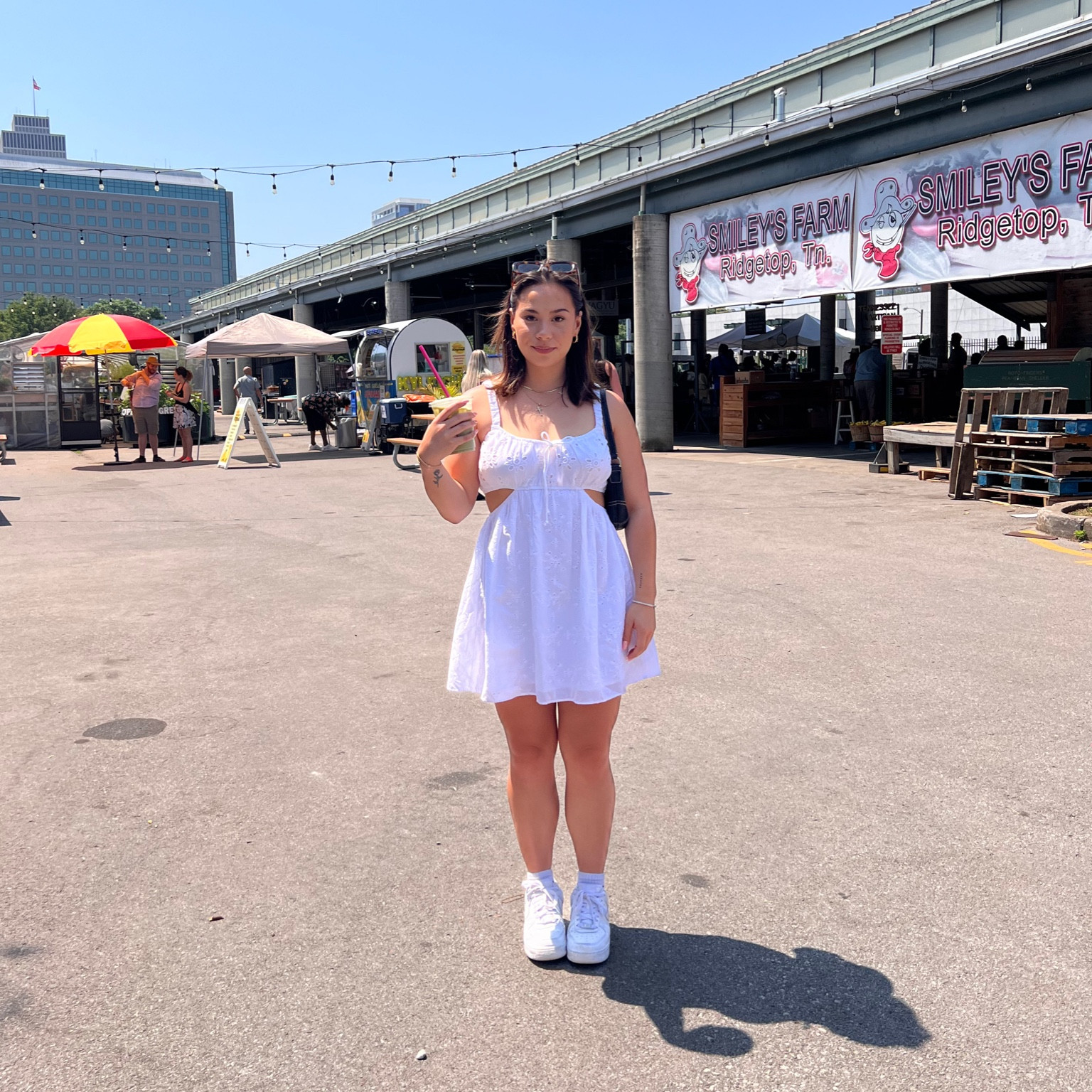 Casual white summer dress with small cutouts to wear for a day at the farmers market! Dress is from American Eagle! Paired with white Air Force 1’s and black oak and Fort sunglasses! 

#LTKunder50 #LTKtravel #LTKFind