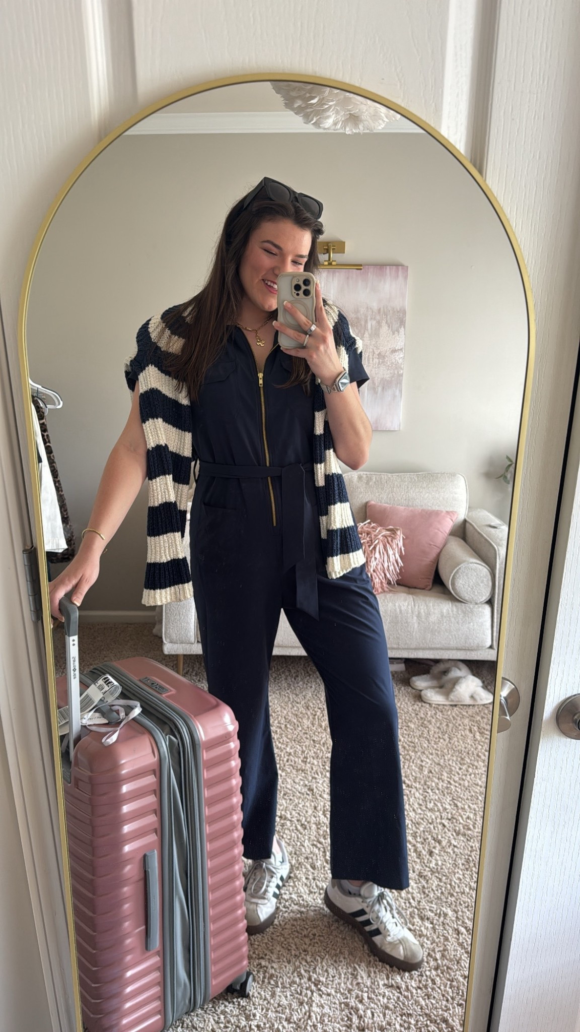 Travel outfit - navy jumpsuit, striped sweater, & pink suitcase!!!😍🤌🏻

#LTKTravel