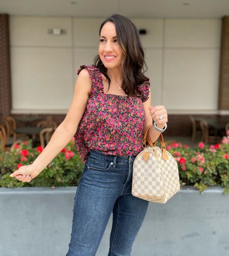 Floral cropped top and jeans. Love this combo. It’s not crazy cropped which is nice. Last thing I want is to look like things are hanging out that shouldn’t. 
Runs tts. Wearing an xs. 
Jeans are a 27 I could do a 26 now. 
They run tts. 
-LTKpetite 
#ltkspring 
#floraltop 

#LTKFind #LTKunder100 #LTKunder50