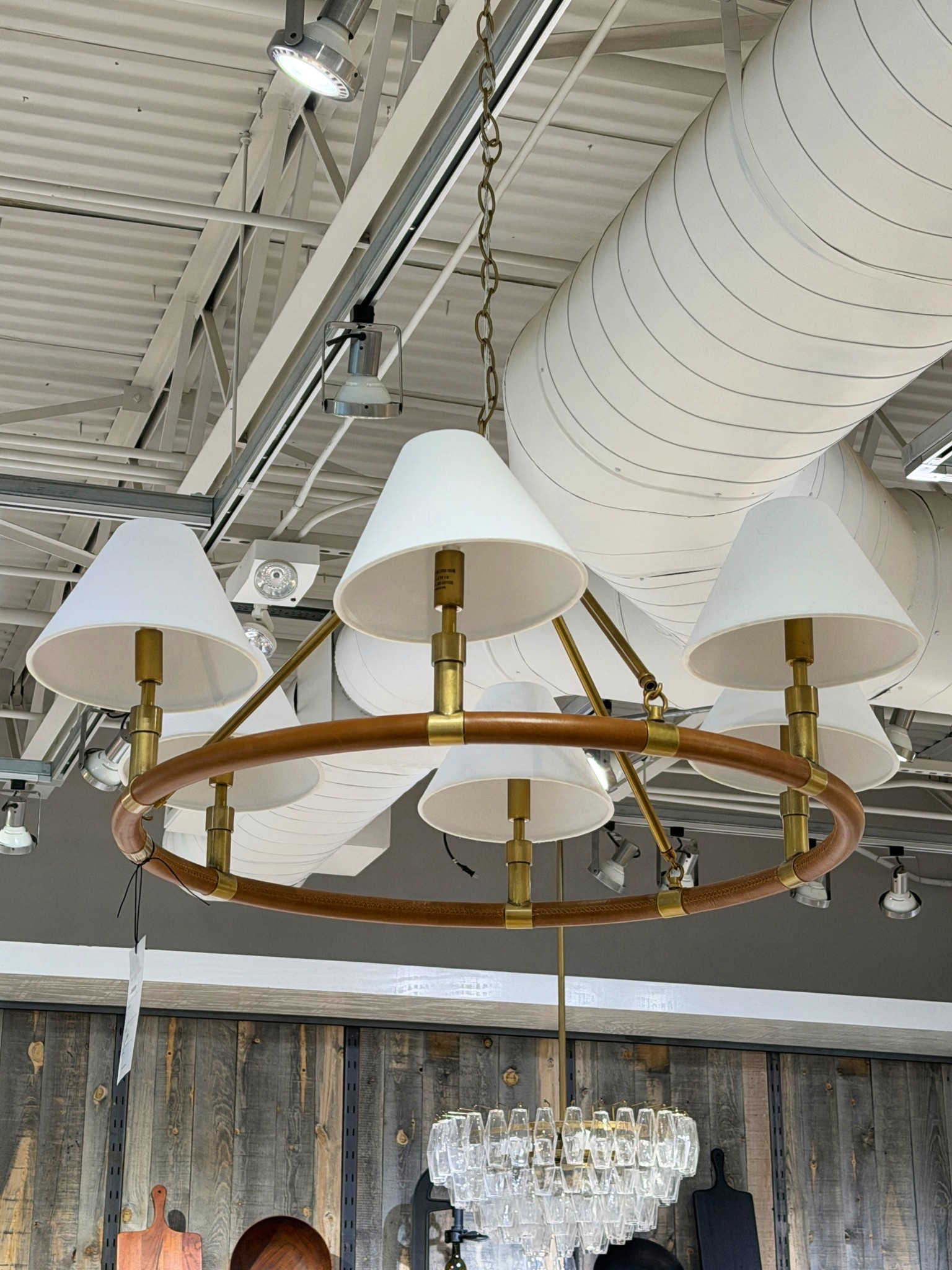 The Chambers Leather Round Chandelier from Pottery Barn pairs a vintage brass frame with rich caramel leather detailing, creating a warm, elevated look that feels both classic and modern. 🤎 Such a beautiful statement chandelier for a dining room, entry, or living space. Linked this one along with other great chandelier options to shop! 💫 #PotteryBarn #Chandelier #Lighting 

#LTKSaleAlert #LTKHome