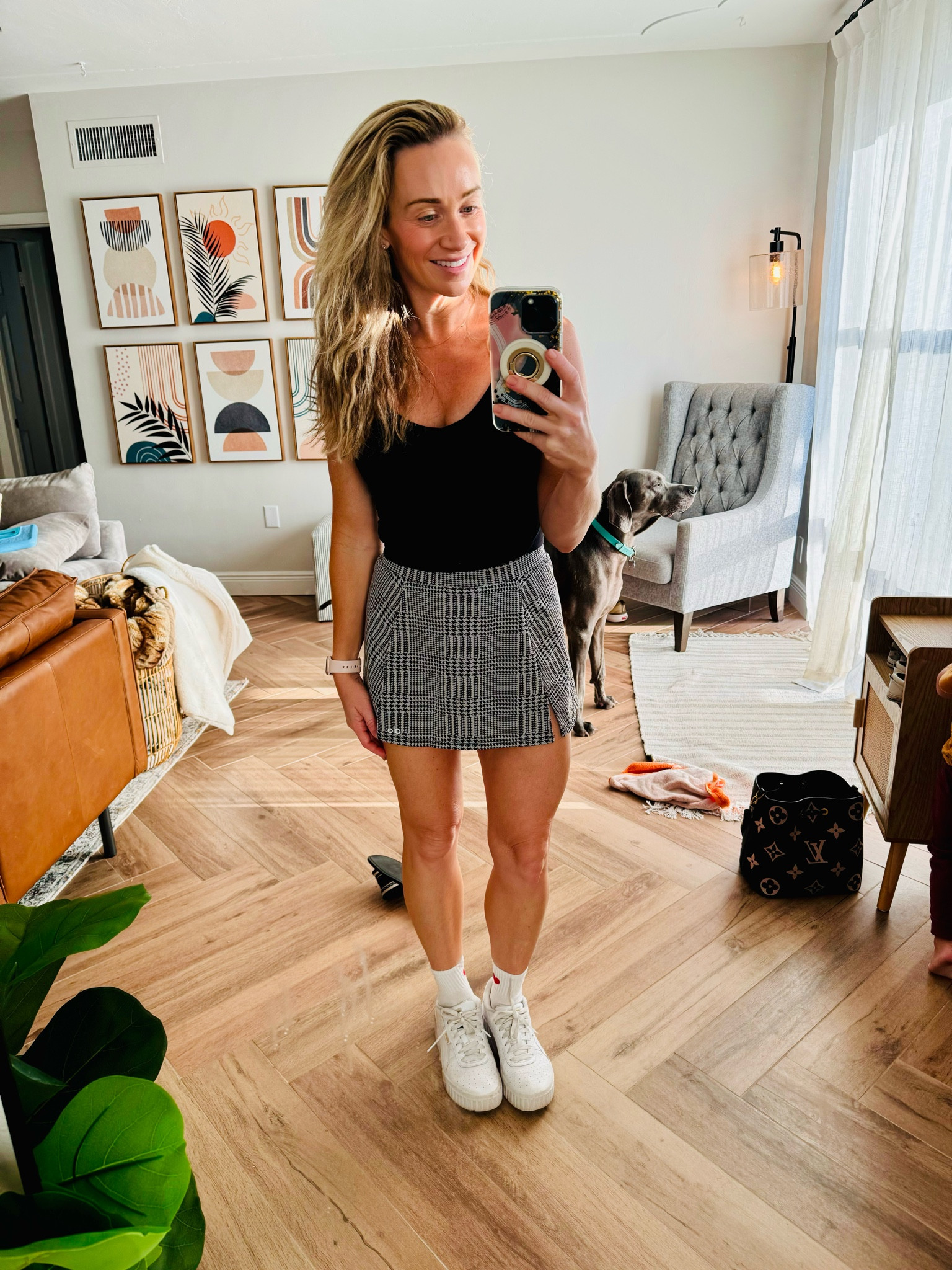I haven’t worn this in months!! I love it so much. I like skirts without pleats better. Live the houndstooth pattern. Paired it with my favorite Amazon brand Lulu align lookalike! 

Skirt: XS
Shirt: Small 

#LTKfindsunder50 #LTKfindsunder100 #LTKFestival