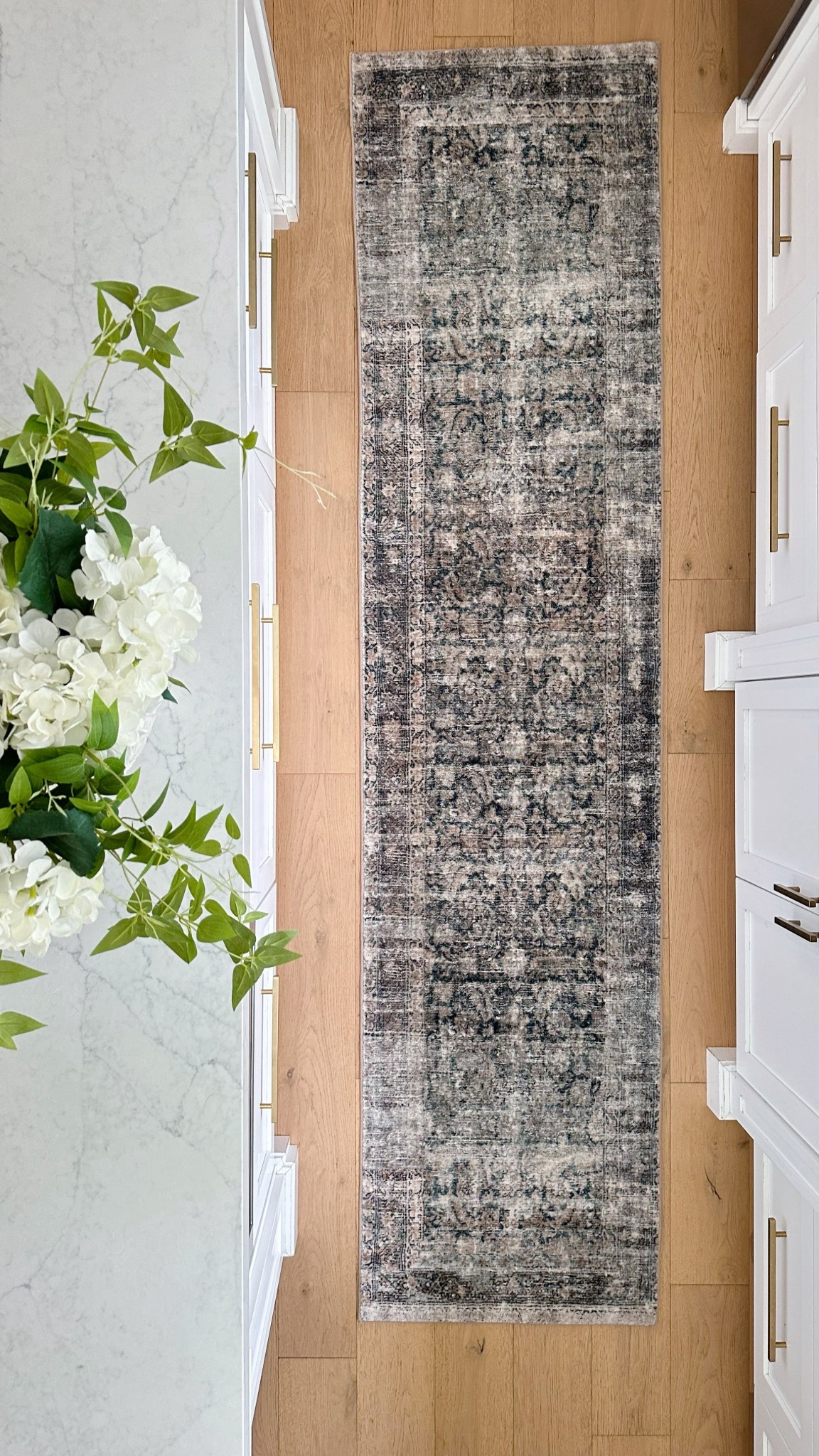Cloudpile kitchen area rug runner. Faux hydrangea and greenery. Spring decor.

#LTKvlog #LTKHome #LTKSaleAlert