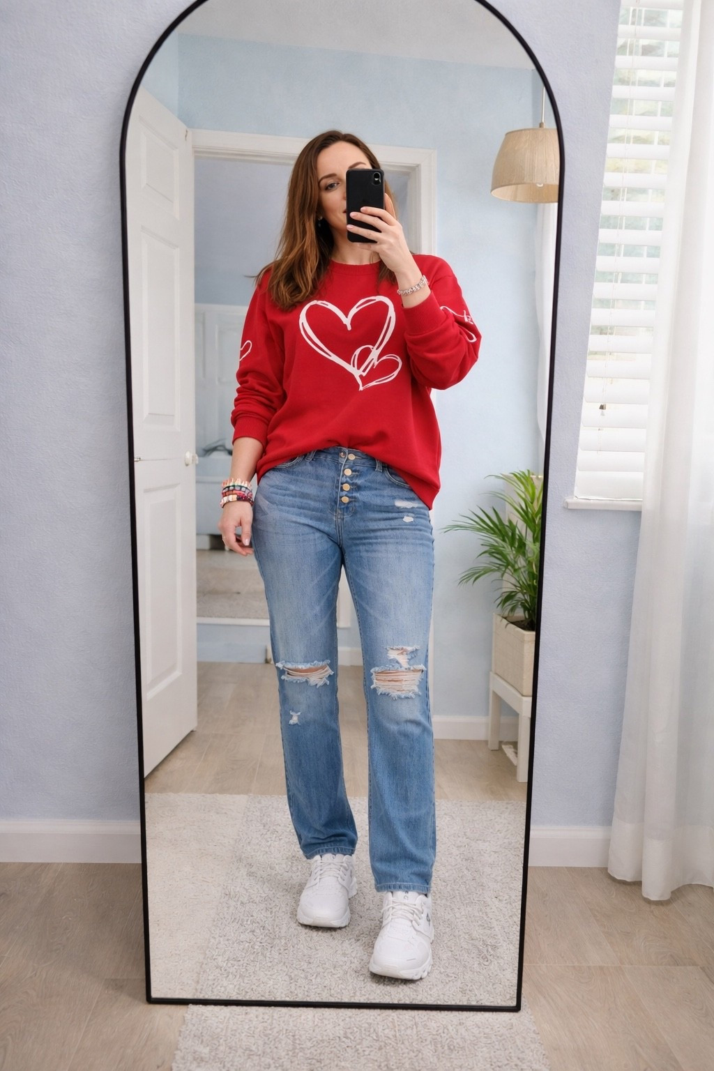 Love is in the air... and in my closet.  If you're looking for a casual but festive outfit for Valentine's (or Galentine's!) Day, this heart graphic sweatshirt is a must-have. It’s super soft and looks great paired with high-waisted denim.

#LTKFindsUnder50 #LTKootd #LTKFindsUnder100