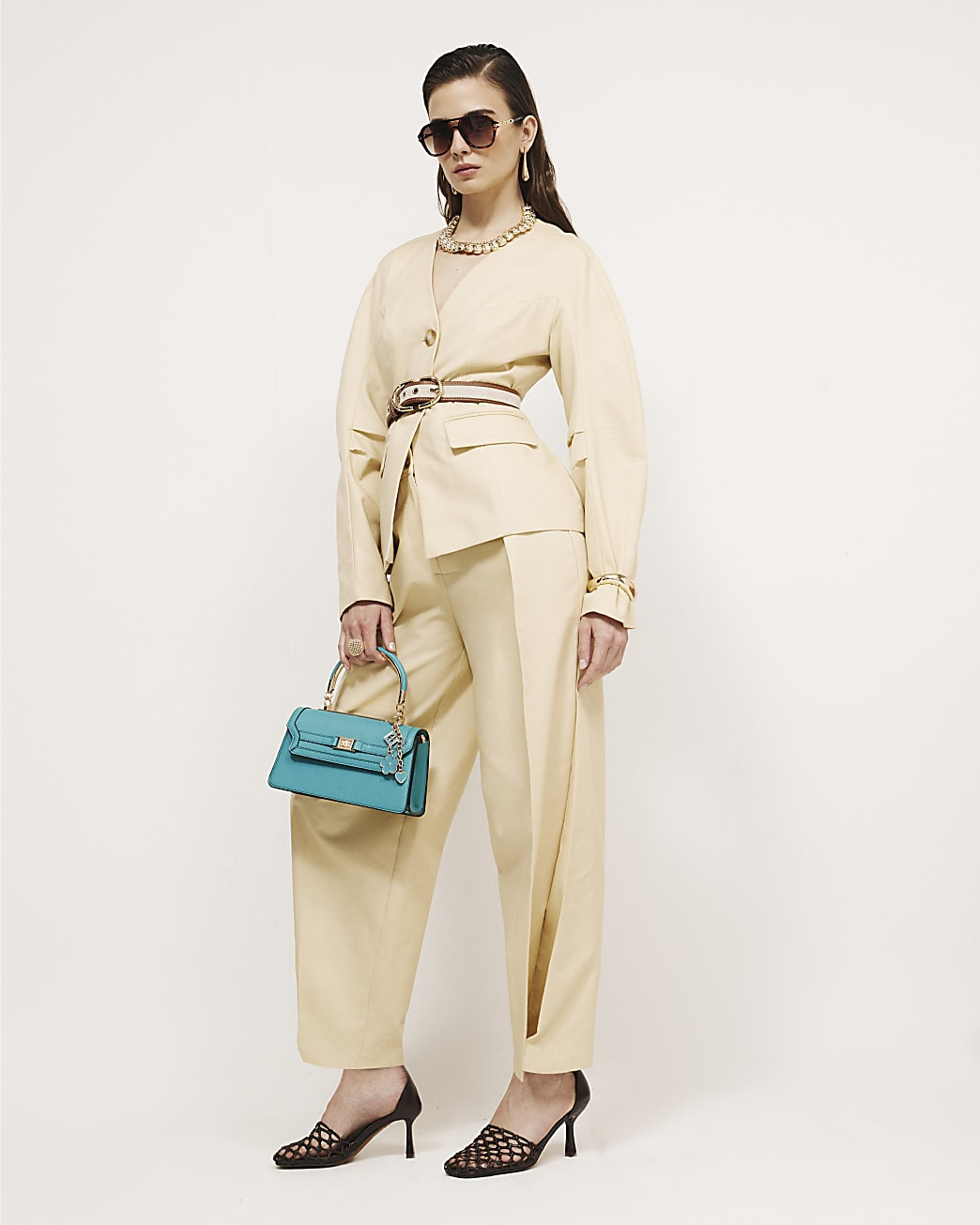 Yellow High Waisted Tapered Trousers | River Island UK & IE