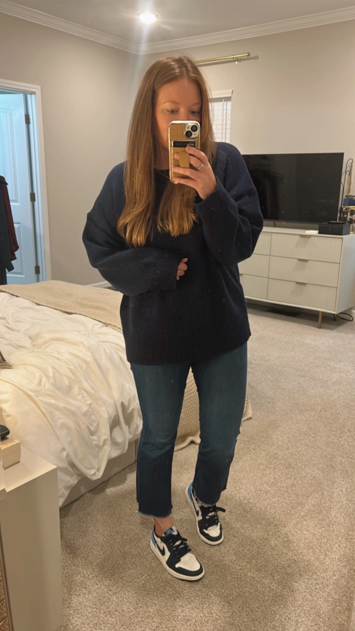 Navy sweater / tts 
Ankle jeans / tts 
Navy and white sneakers 

#LTKFindsUnder100 #LTKFindsUnder50 #LTKootd