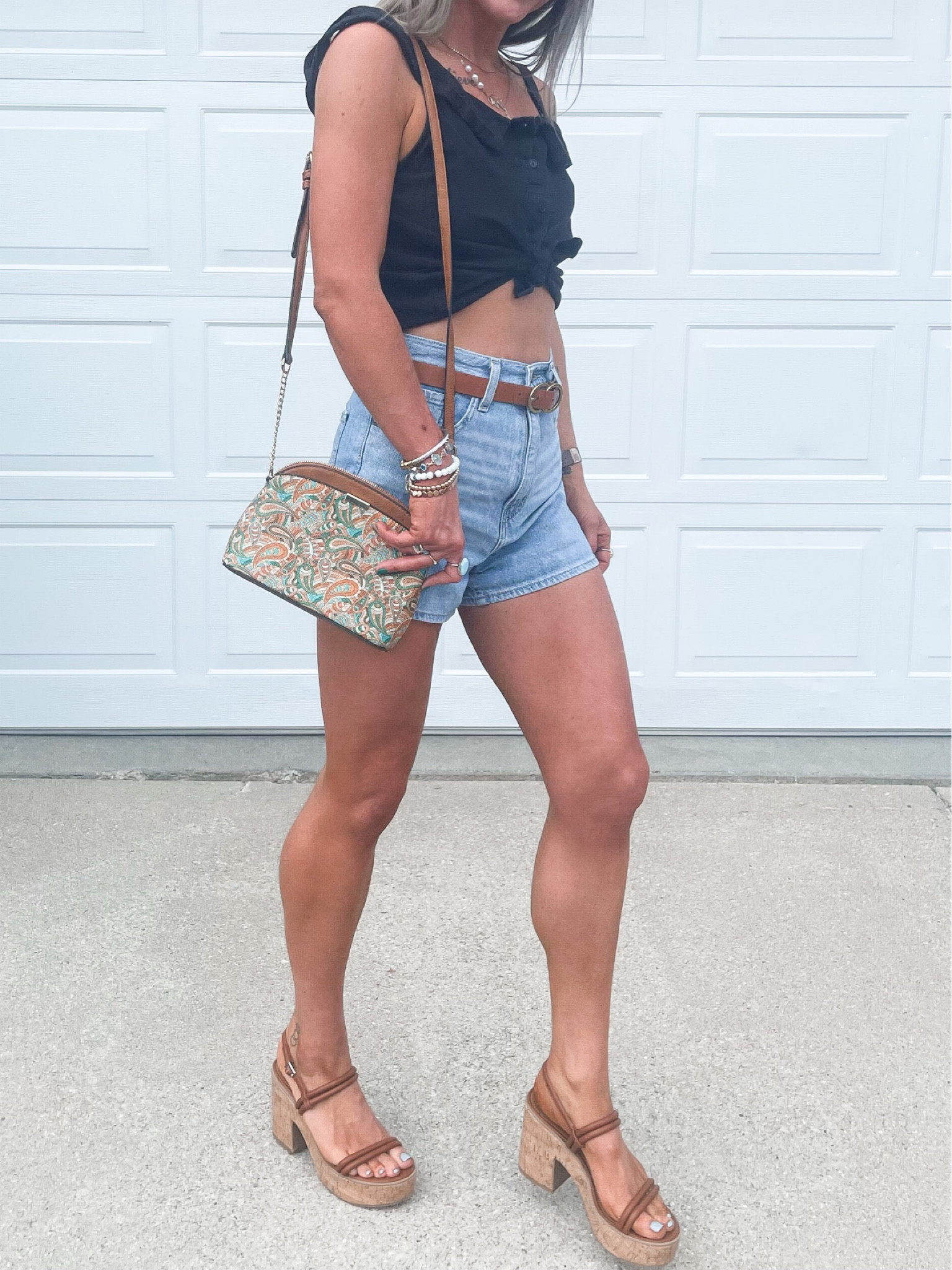 Outfit of the Day. Summer edition | sale finds | looks for less | Levi jean shorts | accessorize 

#levis #chunkyheels #summerlook #ootd #looksforless 

#LTKshoecrush #LTKunder50 #LTKsalealert