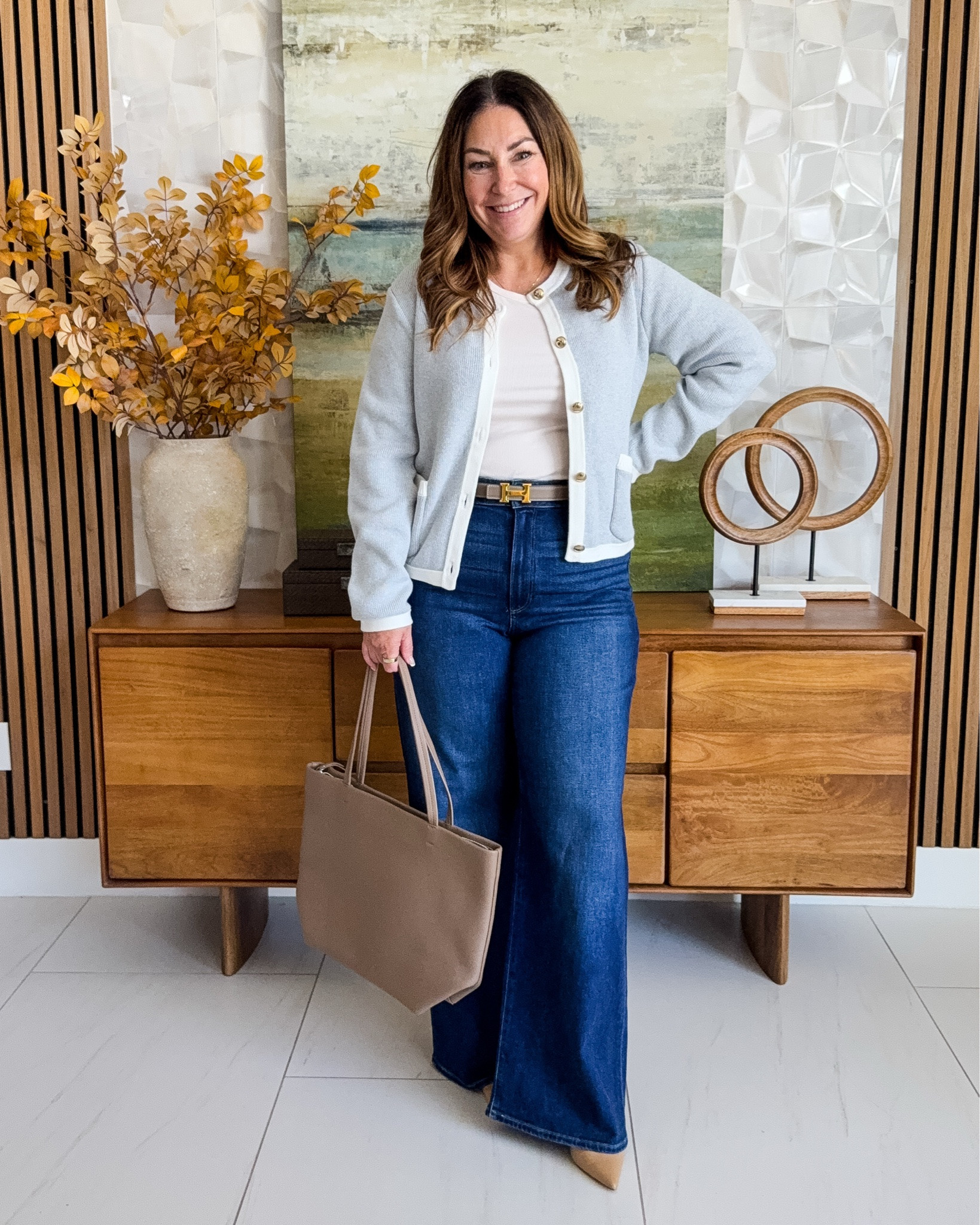 Easy smart-casual layering 🤍 @quince gray cardigan with gold buttons over a white tee, paired with dark wash wide-leg jeans for a polished yet comfortable  casual Friday.

Sizing: Jeans tts, 31 | Tee, L | CArdigan, L

#LTKOver40 #LTKMidsize #LTKWorkwear