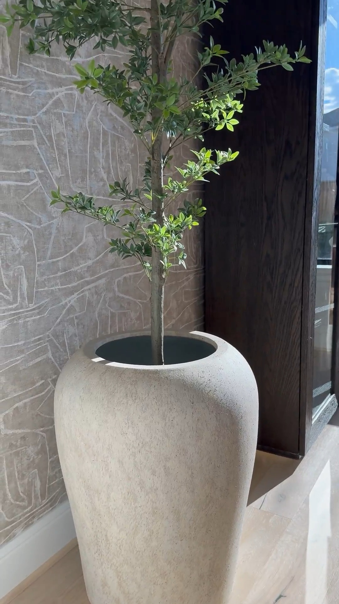 I am absolutely loving this planter from Pottery Barn! It's gorgeous, and the best part is that it's so versatile - it works perfectly for both bigger trees and smaller ones too! 🌳 I love it so much that I actually ended up buying another one, haha! 😆 It's definitely a game-changer for decorating any space. 

#LTKHome #LTKStyleTip #LTKSaleAlert