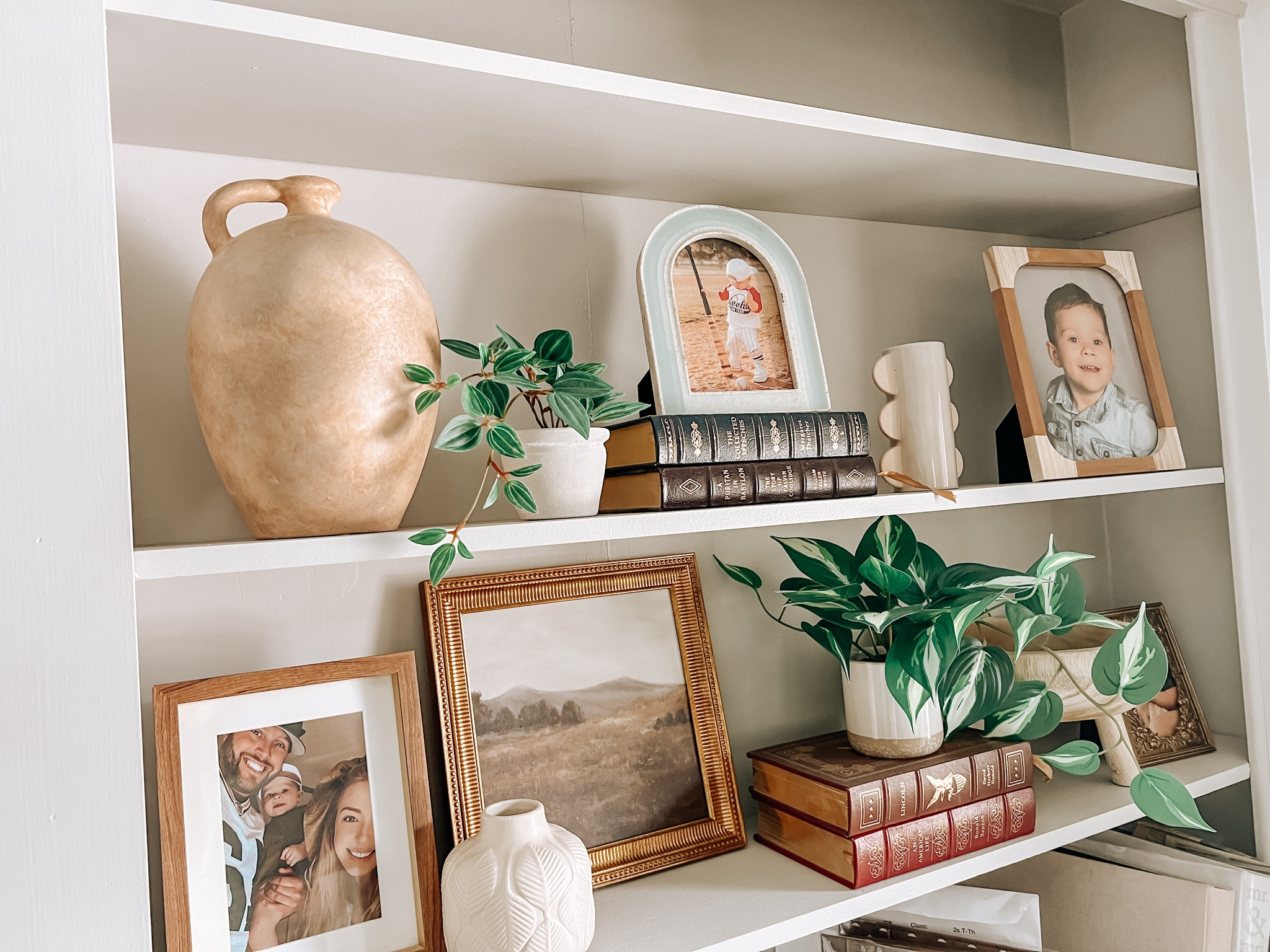 Shelf styling my built ins. My stepfather who is a historian gave us the books so I do not have links to them. 

#LTKFindsUnder50 #LTKHome #LTKStyleTip