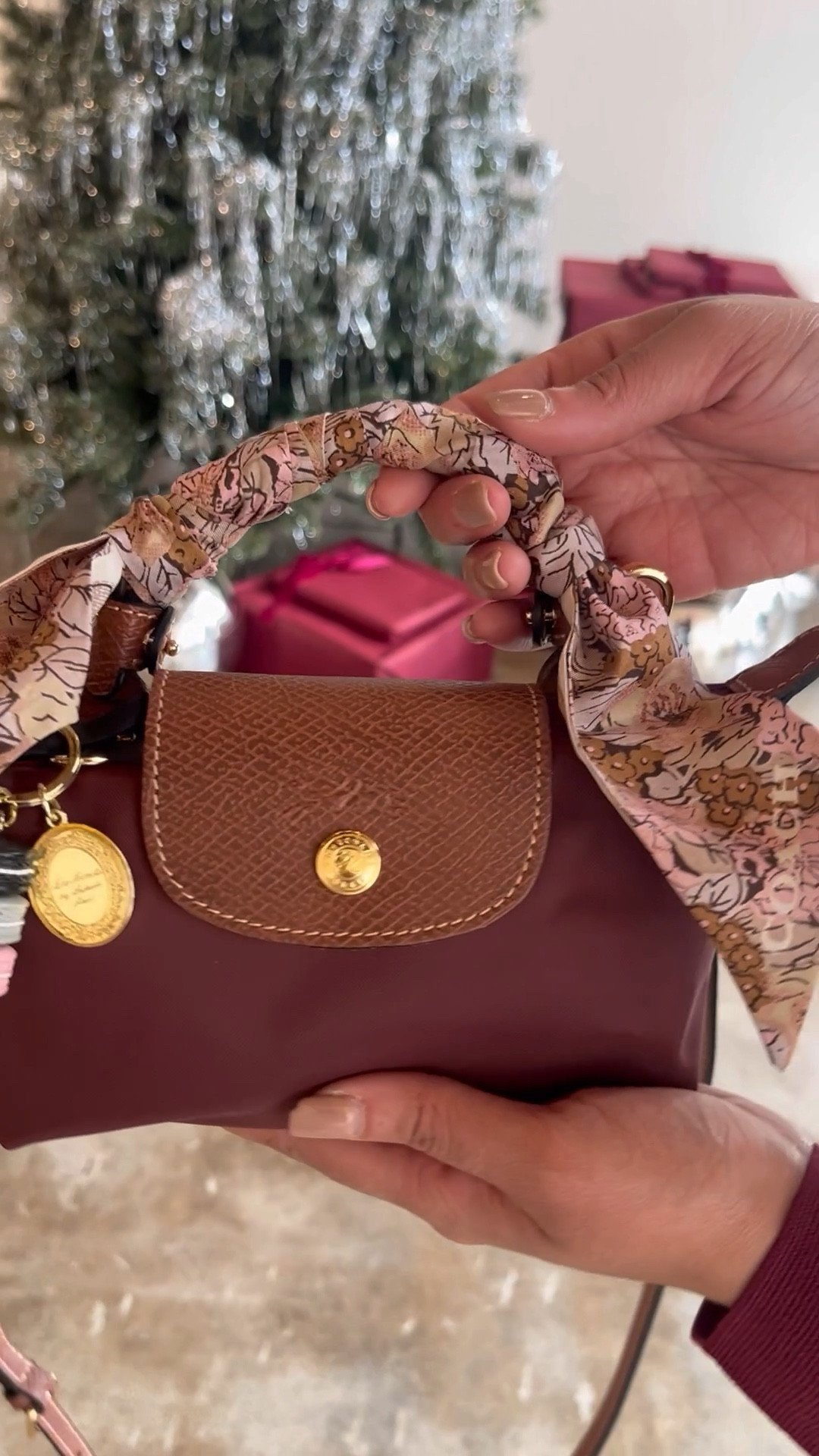 Little Luxuries part 4 features this viral Longchamp makeup bag that fits all of your essentials and so much more. I dressed it up with a purse strap, cute scarf and bag charm and I am ready for the day. This bag comes in a variety of colors but I picked this burgundy shade since it’s on trend right now. #courthousecouture 

#LTKItBag #LTKFindsUnder100 #LTKGiftGuide