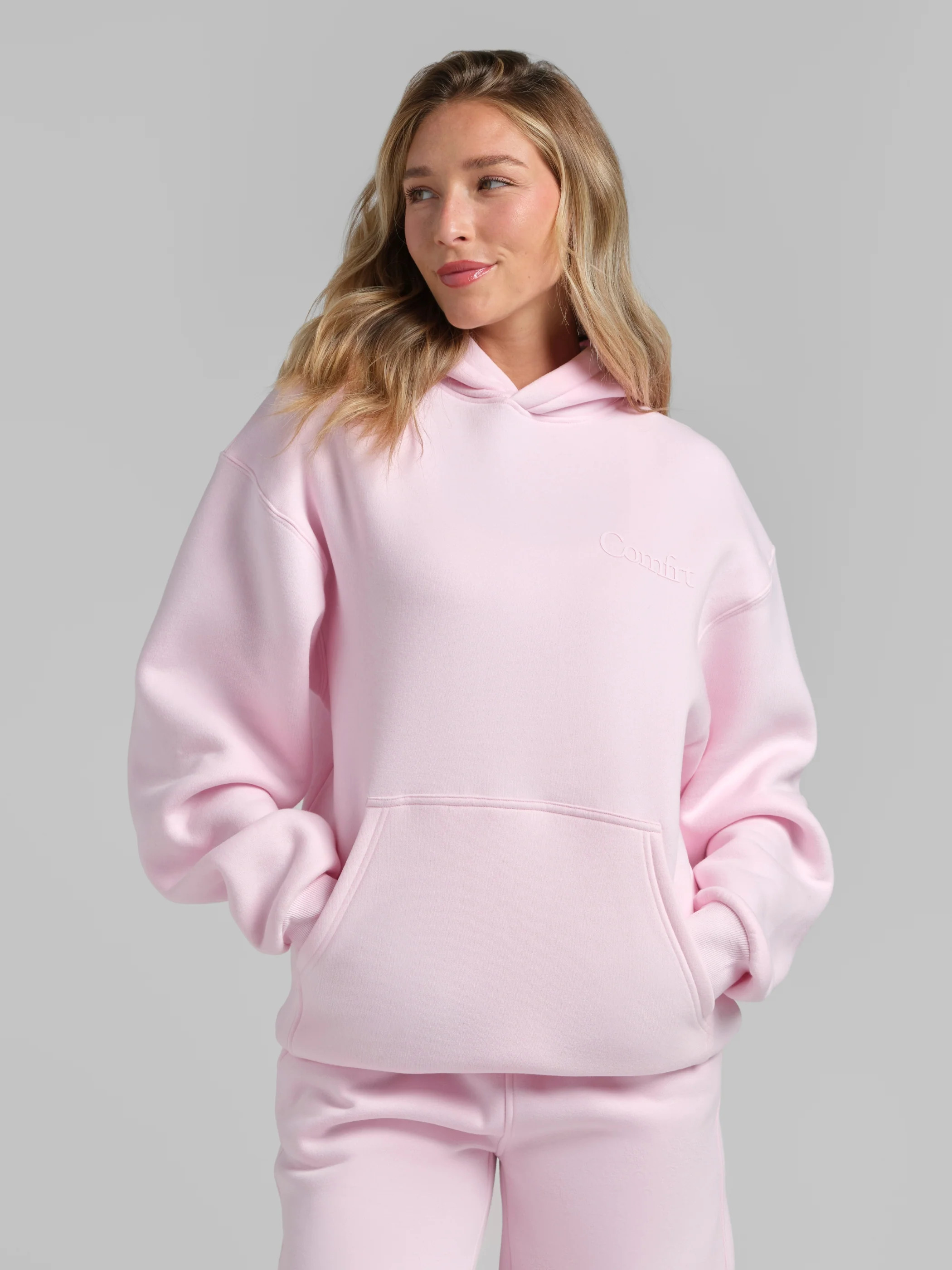 Comfrt Minimalist Hoodie – Mega - Powder Pink / S | Shop.app