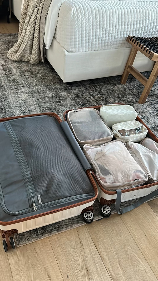 Shop my Amazon travel finds featuring cite white luggage, packing cubes, &…