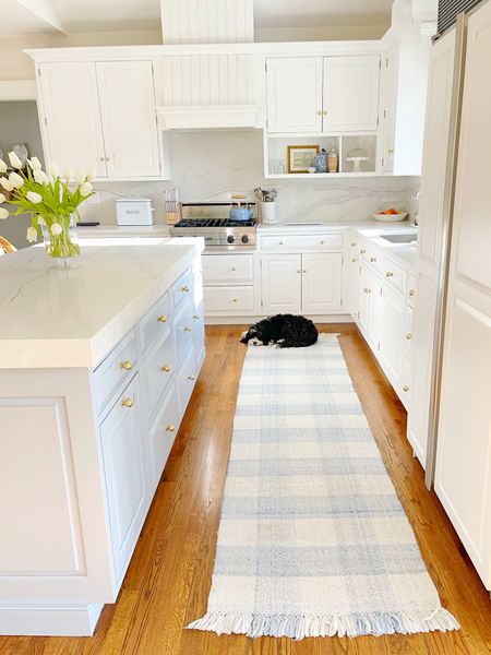 Our pretty Serena & Lily light blue gingham kitchen runner is high performance and 20% off right now!! Get 20% off everything sitewide, including sale with code: SPRING! 🙌🏻 linked our S&L kitchen items here!

Island color: BM blue Heather
Countertops: Raphael stone calcutta Ana quartz

#LTKFind #LTKsalealert #LTKhome