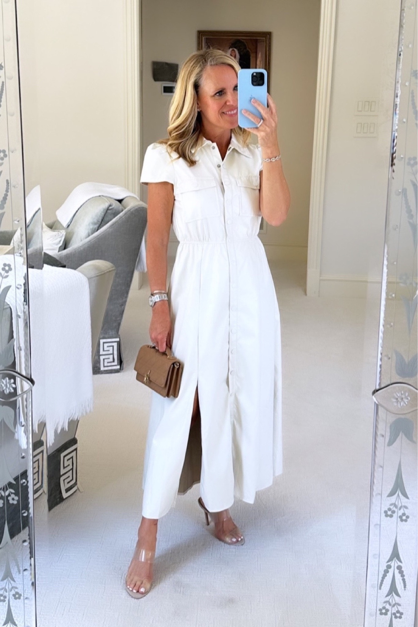 I love a leather midi dress and this style in ivory is especially flattering and easy to wear!

Ivory faux  leather midi dress
Very light weight, soft leather fabric
I love the front slits!
Fits true to size. I am wearing. XS 
Comes in sizes  XS-XL
Perfect for fall transition 
Paired with tan Dior handbag and transparent heels 
Chic date night 

#LTKfindsunder100 #LTKstyletip #LTKSeasonal